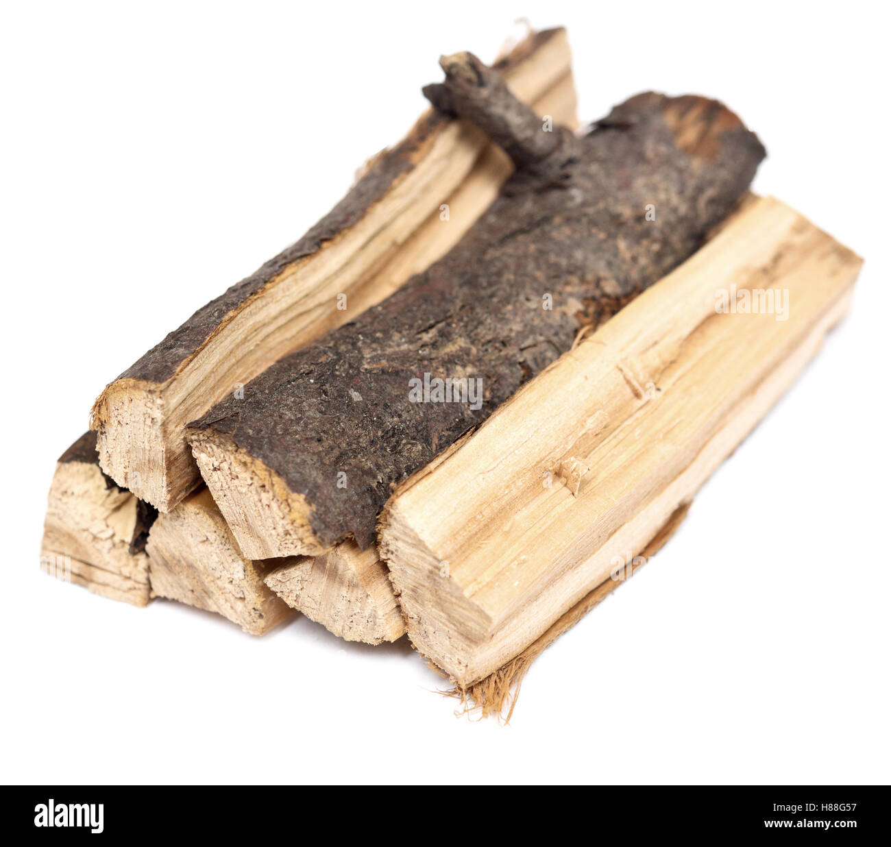 stack of firewood isolated on white background Stock Photo - Alamy