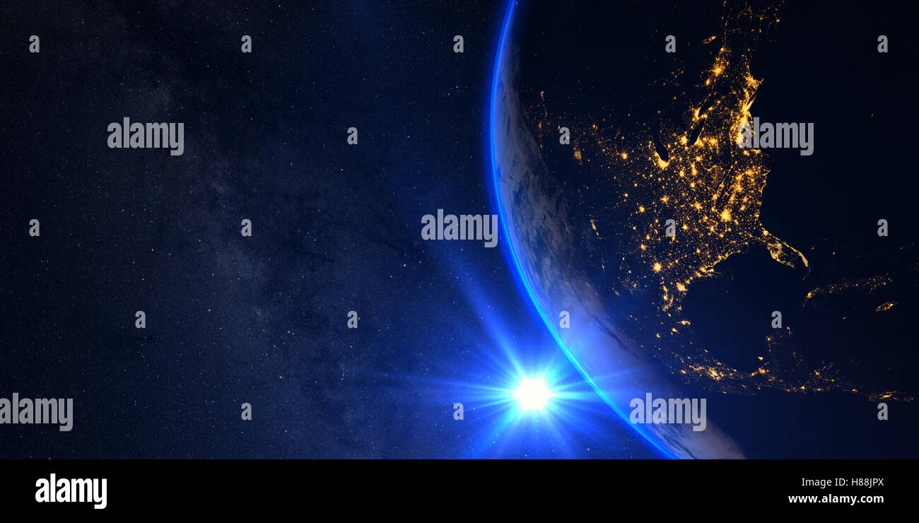 Planet Earth with a spectacular sunrise with milkyway in the background ...