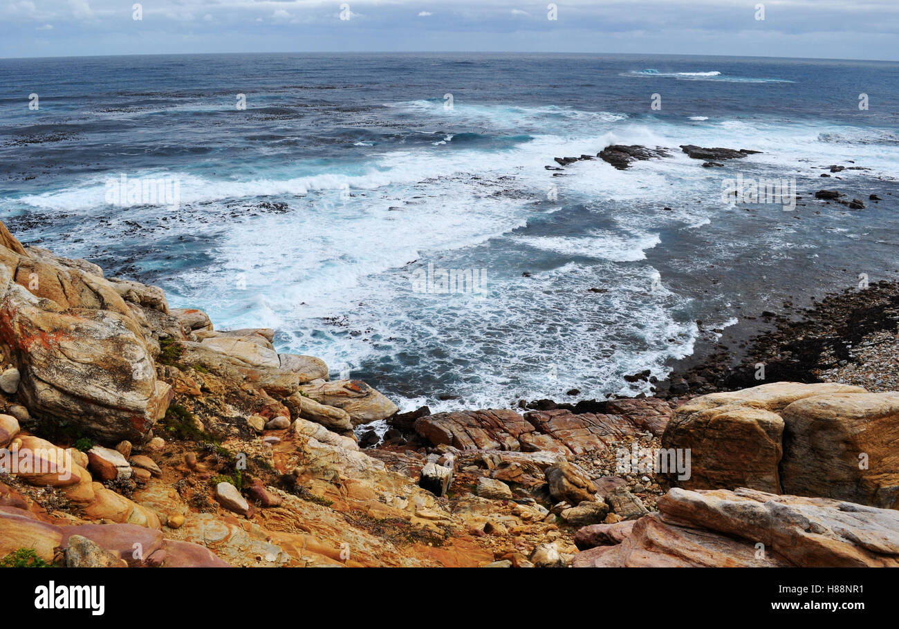 South Africa, driving south: stormy Ocean and weather at the cliff of Cape of Good Hope, rocky headland on the Atlantic coast of the Cape Peninsula Stock Photo