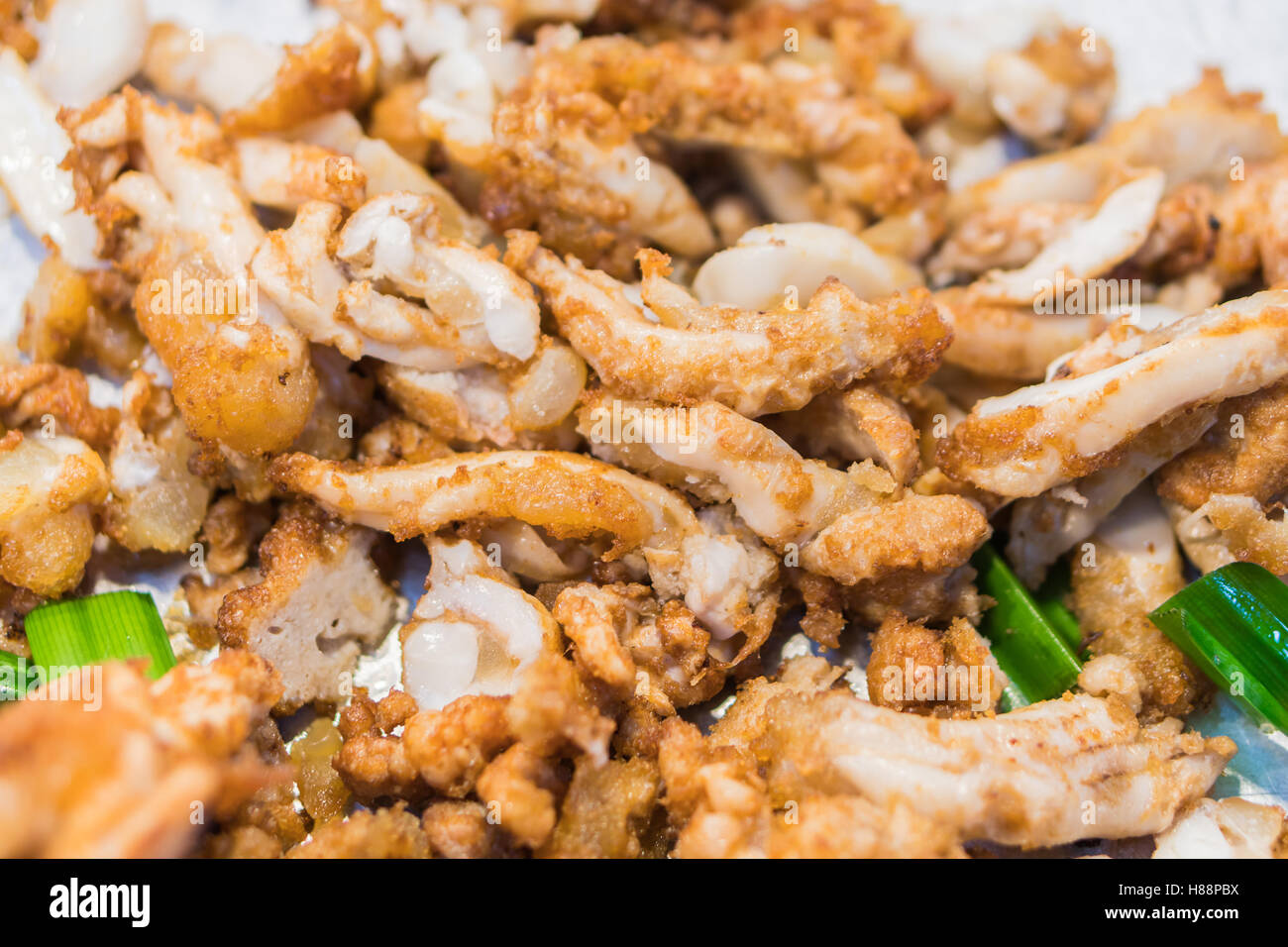 Stir-fried salted egg with squid ,Fried squid eggs Stock Photo