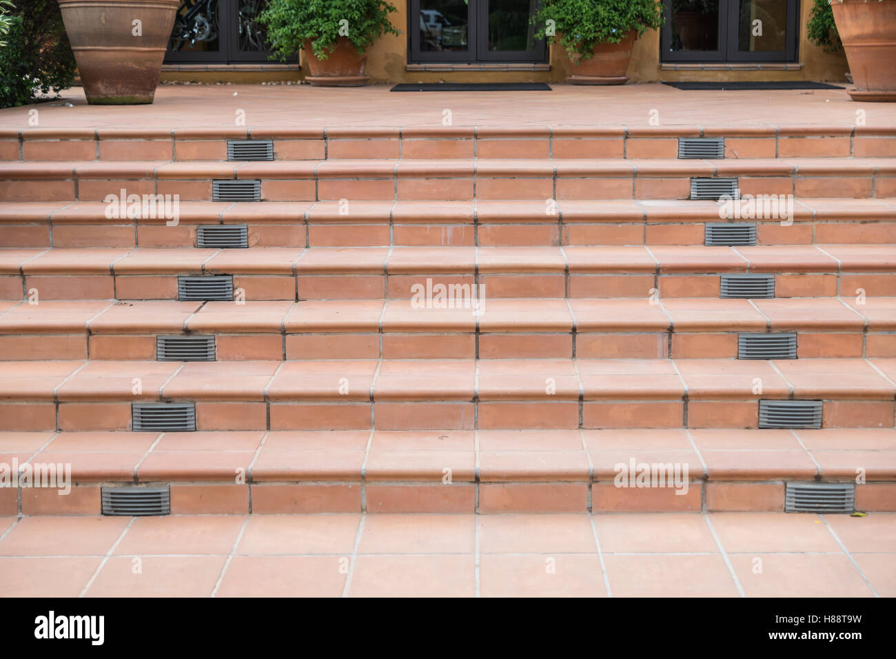 Red brick staircase at public park Stock Photo