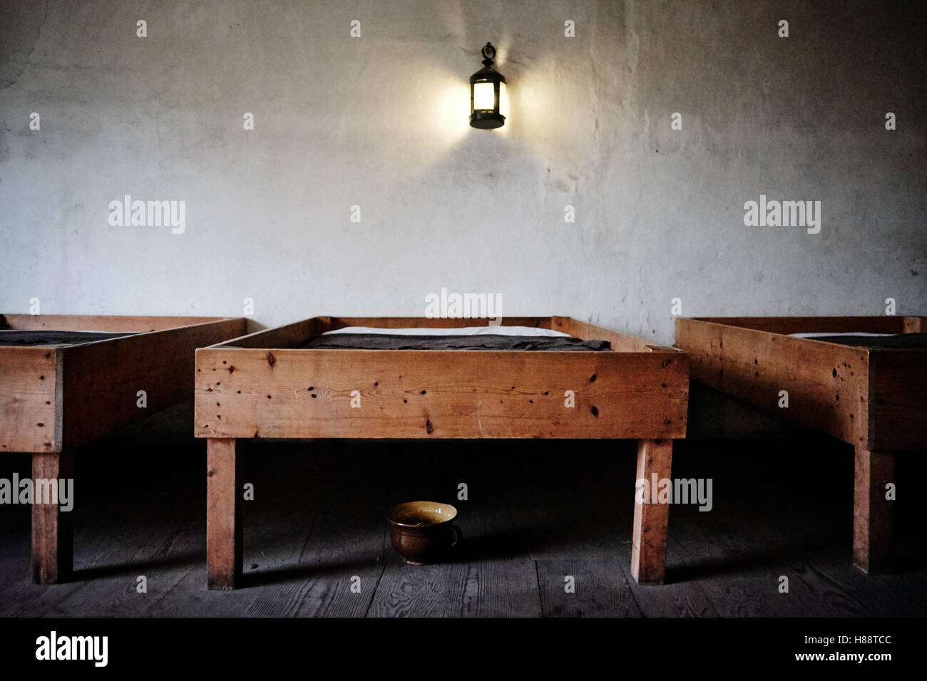 Bed with chamber pot in bedroom of the Apprentice House at Quarry Bank