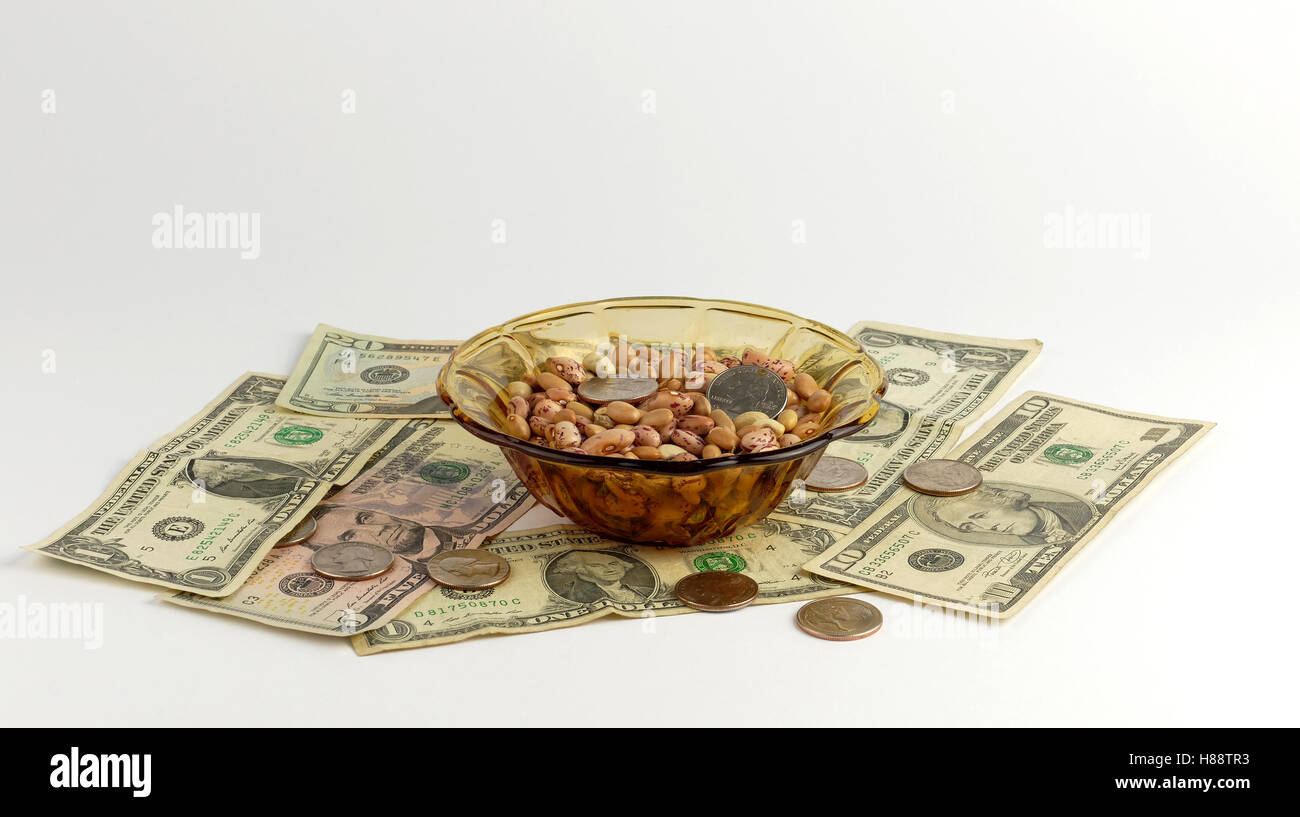 Beans and money isolated on white background Stock Photo Alamy
