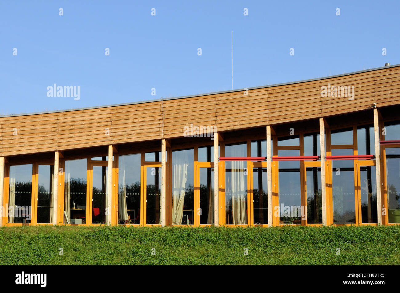 Southern facade of the low-energy sustainable building of Slunakov Center for Ecological and Educational Activities, design by Stock Photo