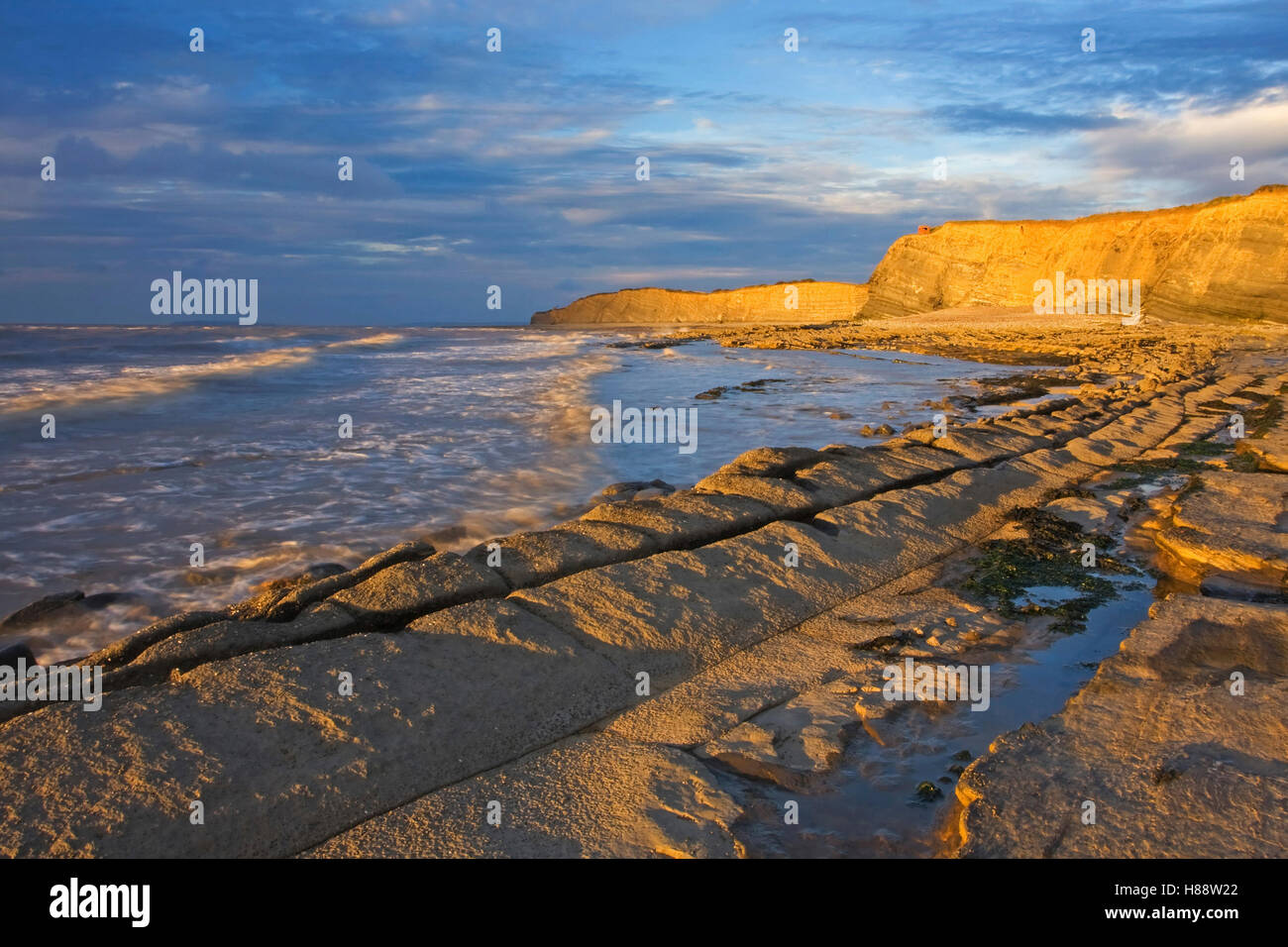 Beach, cliffs, reflecting sunlight, Somerset, England, United Kingdom, Europe Stock Photo