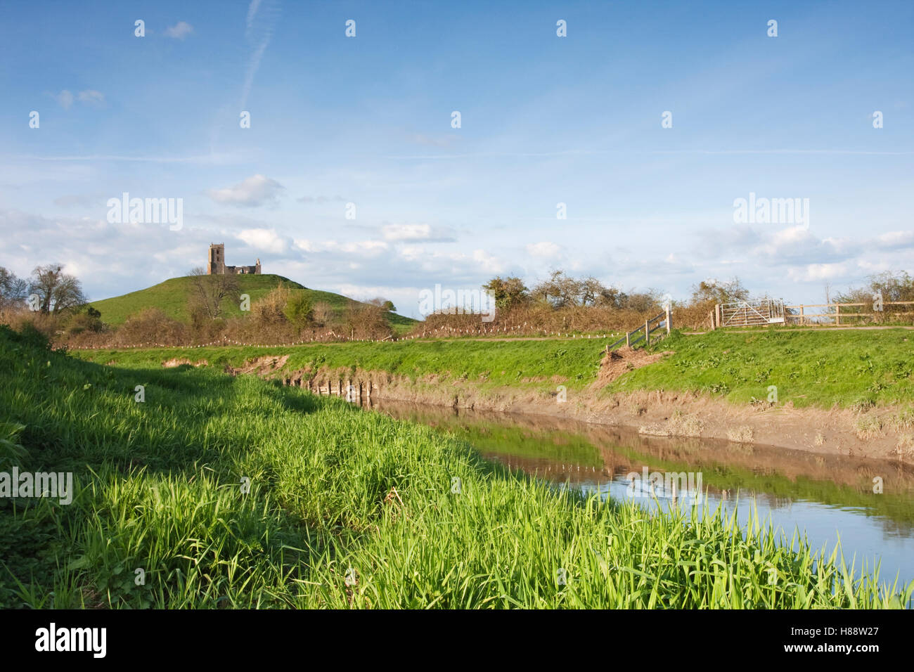 View of Burrow Mump in the early evening, with the River Parrett in the foreground, Somerset, England, United Kingdom, Europe Stock Photo