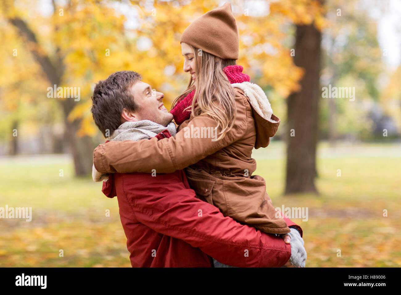 happy young couple meeting in autumn park Stock Photo - Alamy