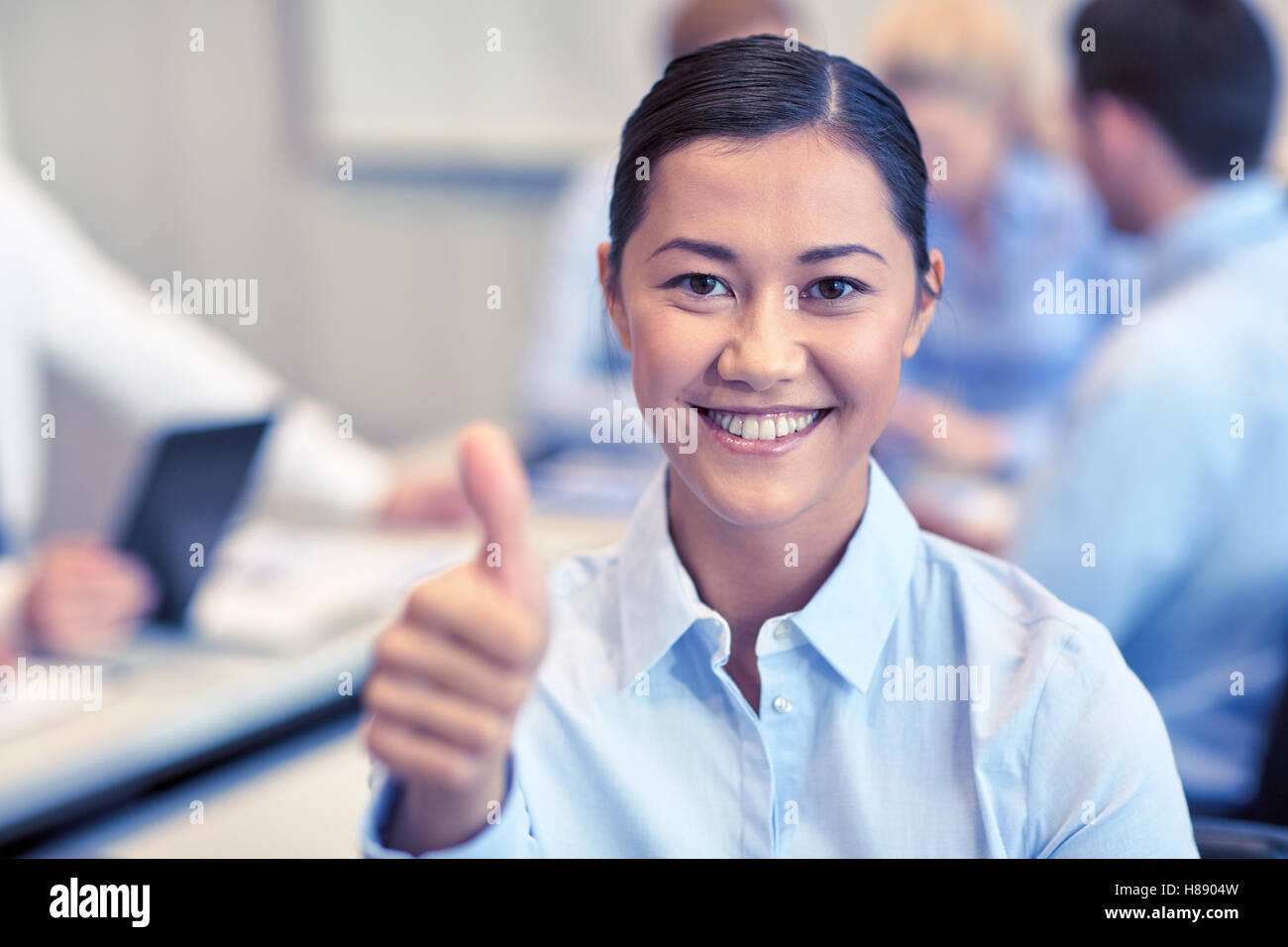 group of smiling businesspeople meeting in office Stock Photo - Alamy