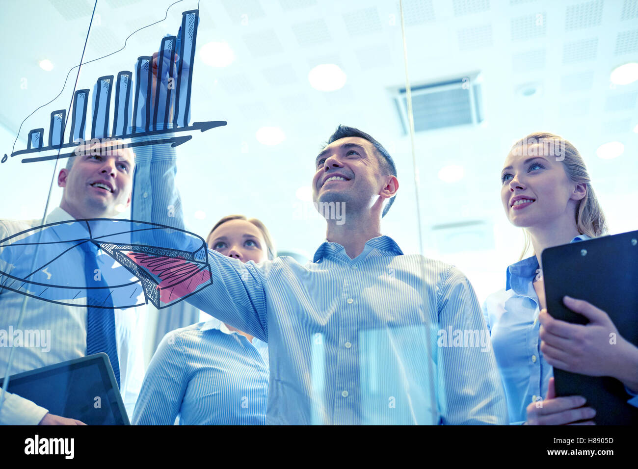 smiling business people with marker and stickers Stock Photo - Alamy