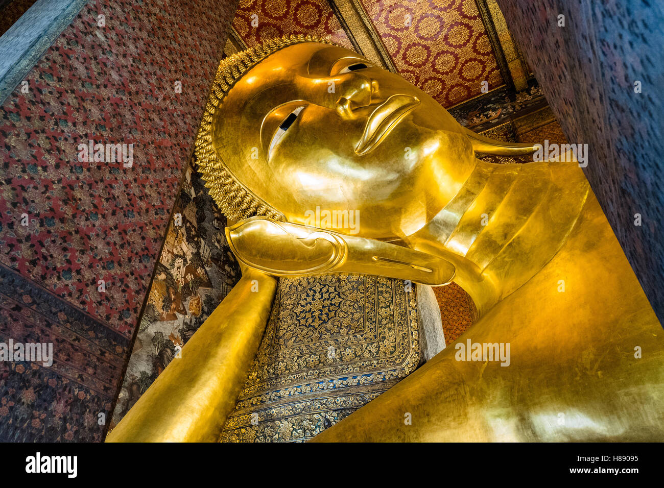 Giant reclining Buddha at Wat Pho in Bangkok. This is one of the most famous Buddha images in Thailand Stock Photo