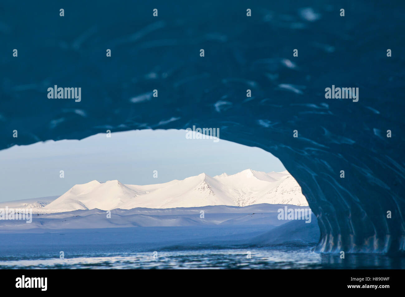 View from ice cave over the Fjallsárlón Glacier Lagoon, glacial lake in winter, Iceland Stock Photo