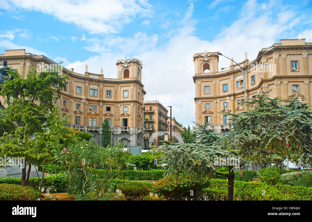The view on the facade mansions of Rome Street (Via Roma) behind the ...