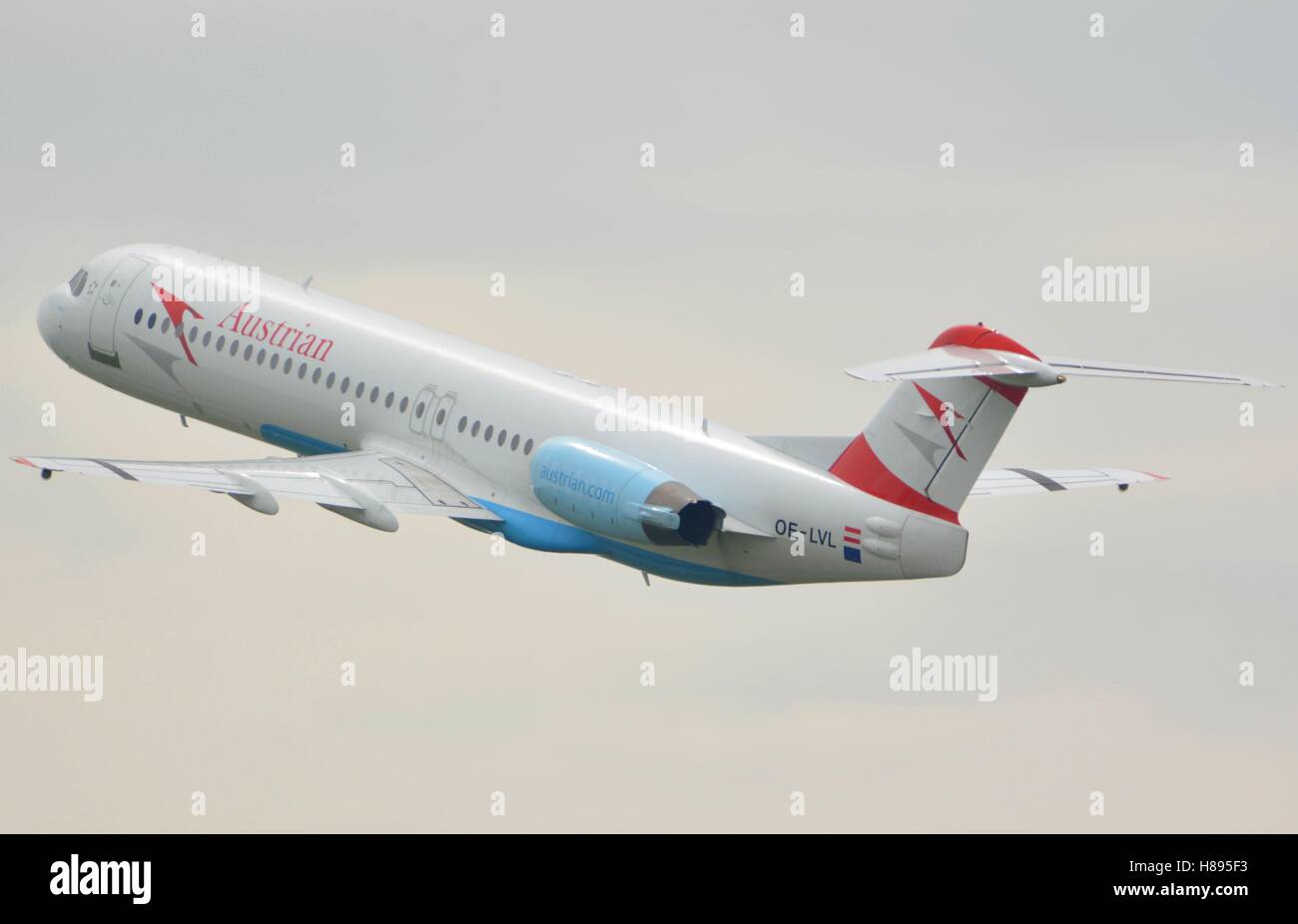 Fokker 100 taking to the skies Stock Photo