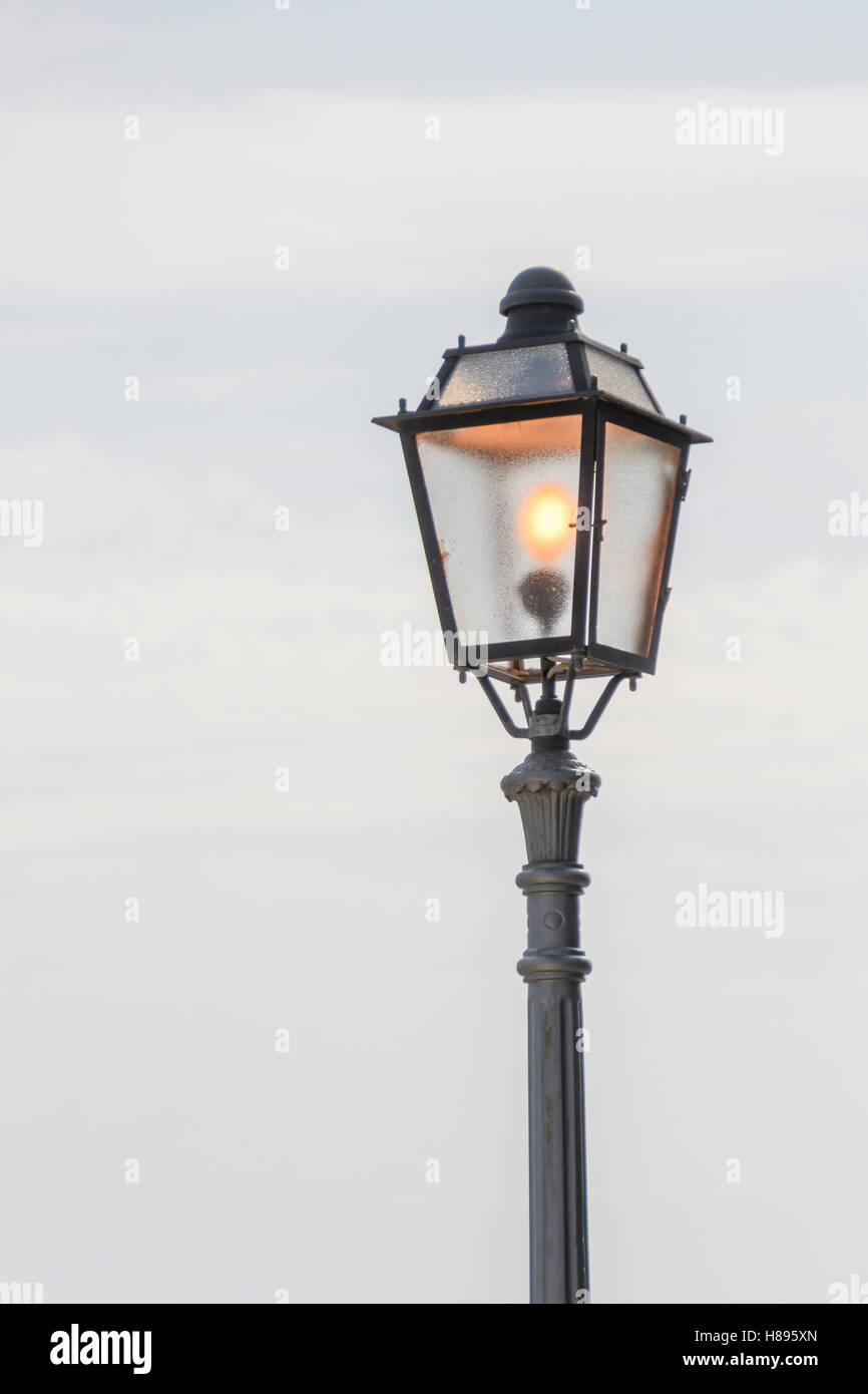 Vintage, old street lamp in classic style, made of cast iron and or metal Stock Photo
