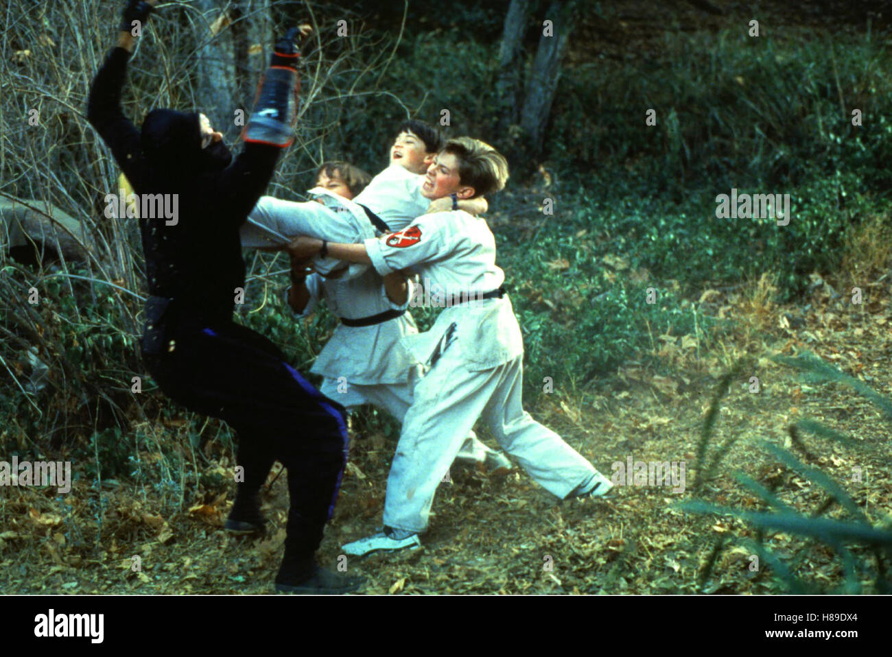 3 Ninja Kids, (3 NINJAS), USA 1992, Regie: Jon Turteltaub, RAND KINGSLEY,  ganz li ; von li nach re: MAX ELLIOTT SLADE, CHAD POWER und MICHAEL  TREANOR, Stichwort: Kampfsport Stock Photo - Alamy