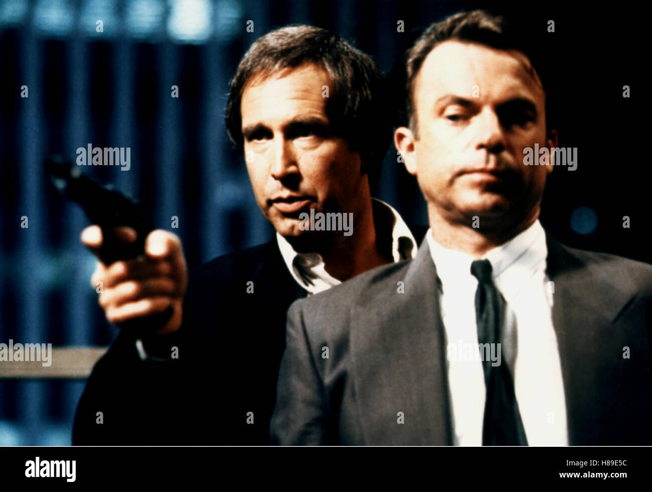 Jagd auf einen Unsichtbaren, (MEMOIRS OF AN INVISIBLE MAN) USA 1992, Regie: John Carpenter, CHEVY CHASE + SAM NEILL, Stichwort: Pistole Stock Photo
