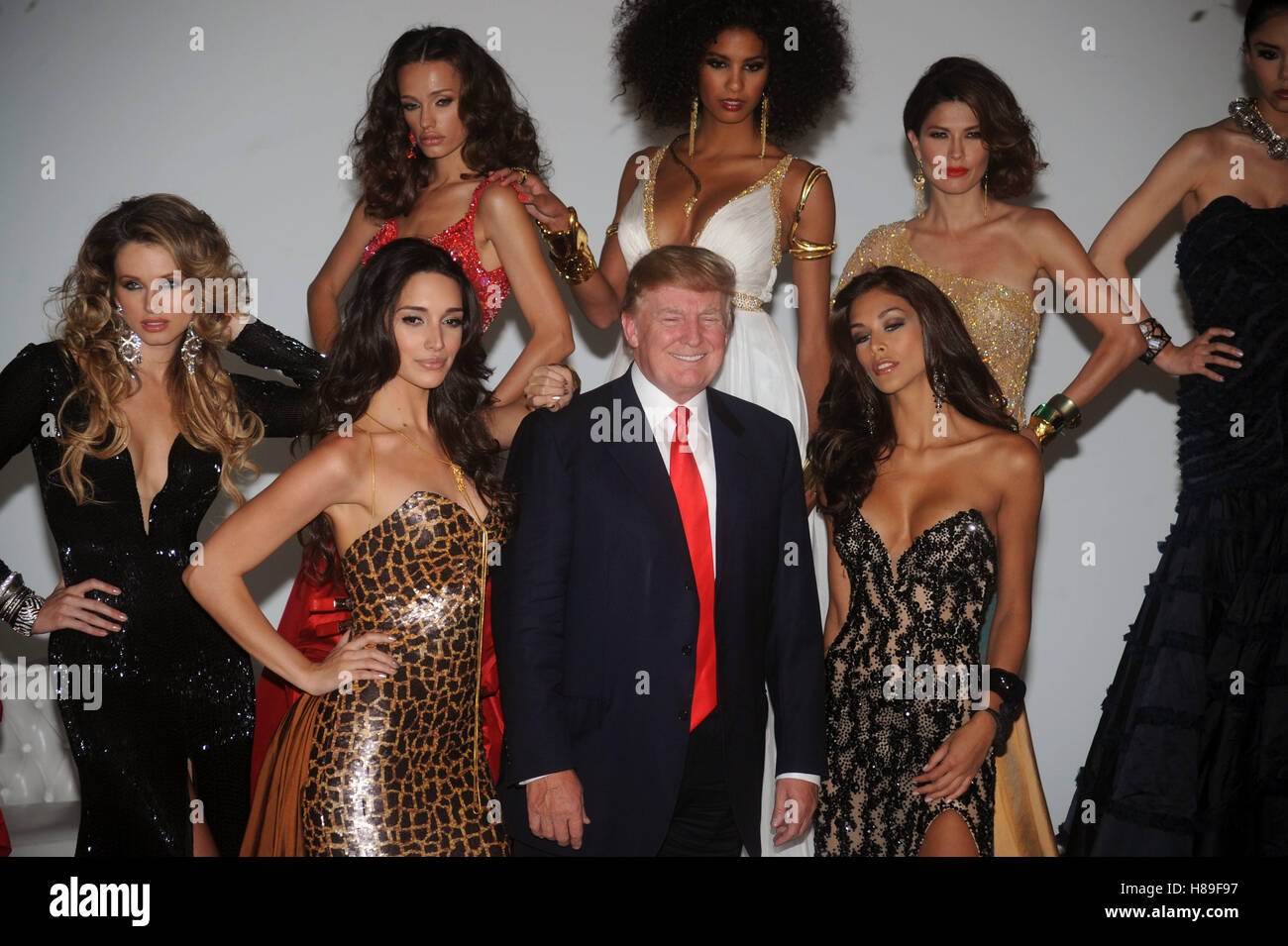 Donald Trump, with Miss USA 2004 Shandi Finnessey, (L) Miss Universe 2003 Amelia Vega and (R) Miss Universe 2008 Dayanna Mendoza attend a Miss Universe photocall at Chelsea Piers, Studio 59 on July 27, 2011 in New York City. Credit: Dennis Van Tine/MediaP Stock Photo