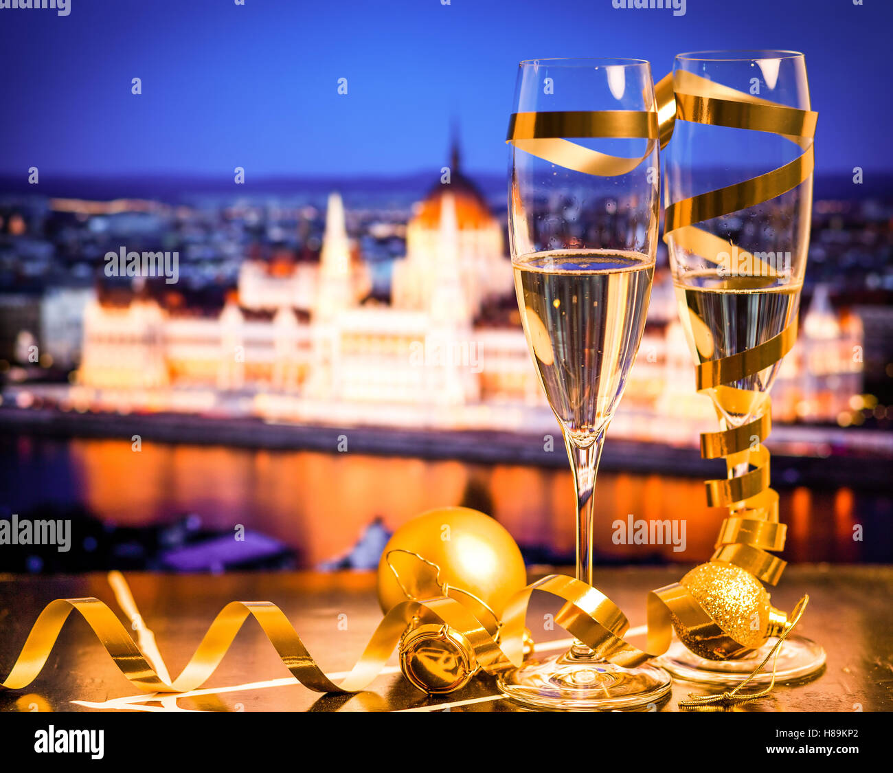 New Year In The City Champagne Glasses And City Lights In The Stock Photo Alamy