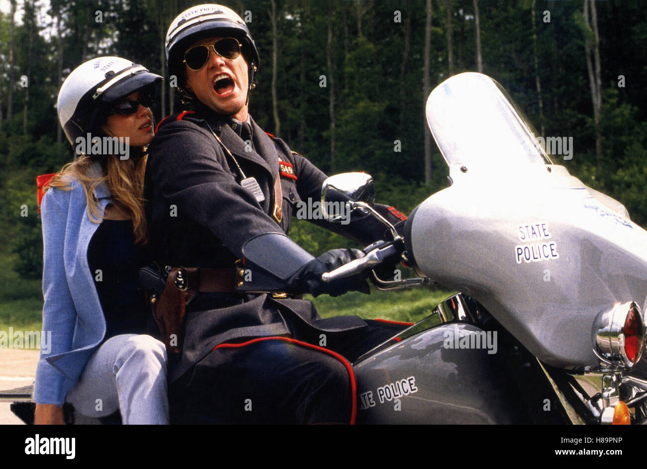 Ich, beide & sie, (ME, MYSELF & IRENE) USA 2000, Regie: Bobby + Peter Farrelly, RENEE ZELLWEGER, JIM CARREY, Stichwort: Motorrad, Motorradfahrer, Motorradhelm, Polizist Stock Photo
