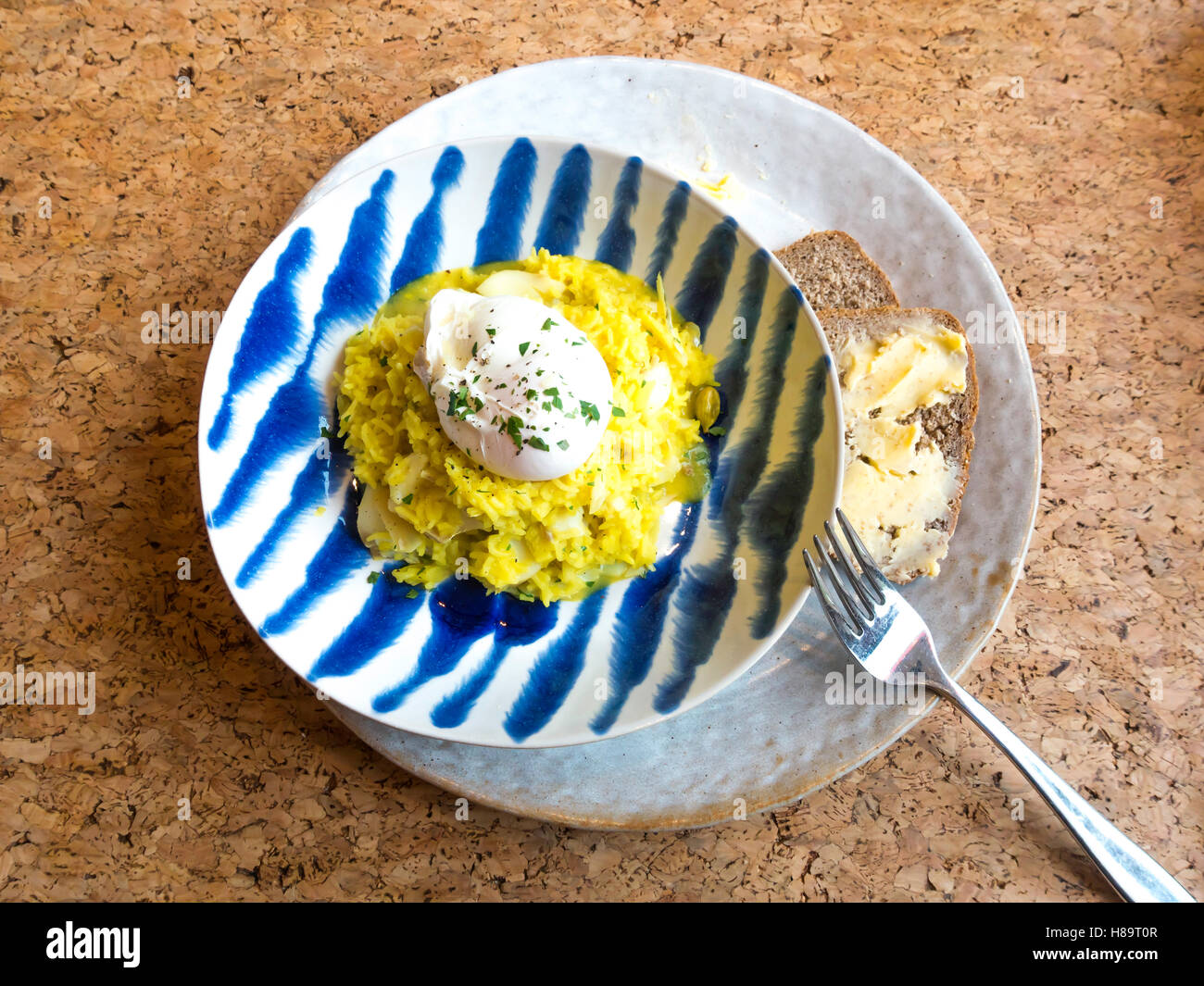 Kedgeree a breakfast dish that originated in India curried rice smoked