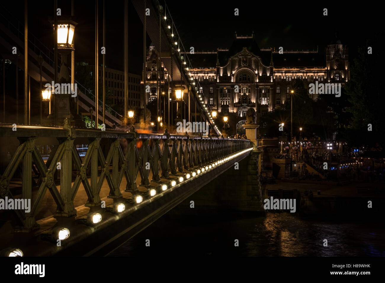 Széchenyi Chain Bridge by night and Four Seasons Hotel Gresham Palace Stock Photo