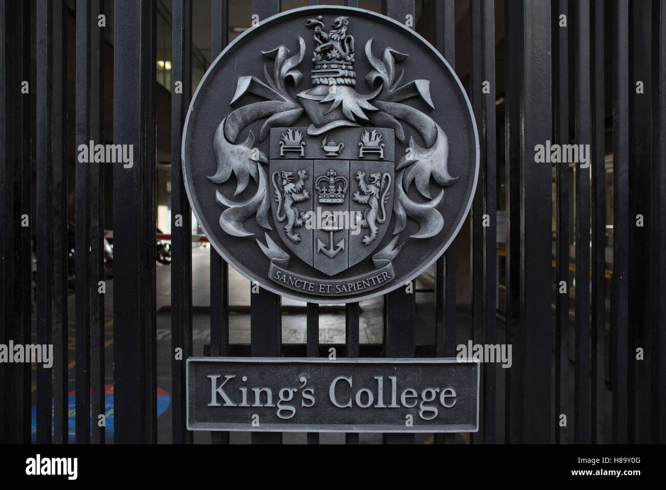 KIng's College London, the seal of King's College on the entrance gates facing the Strand in central London, England, UK Stock Photo