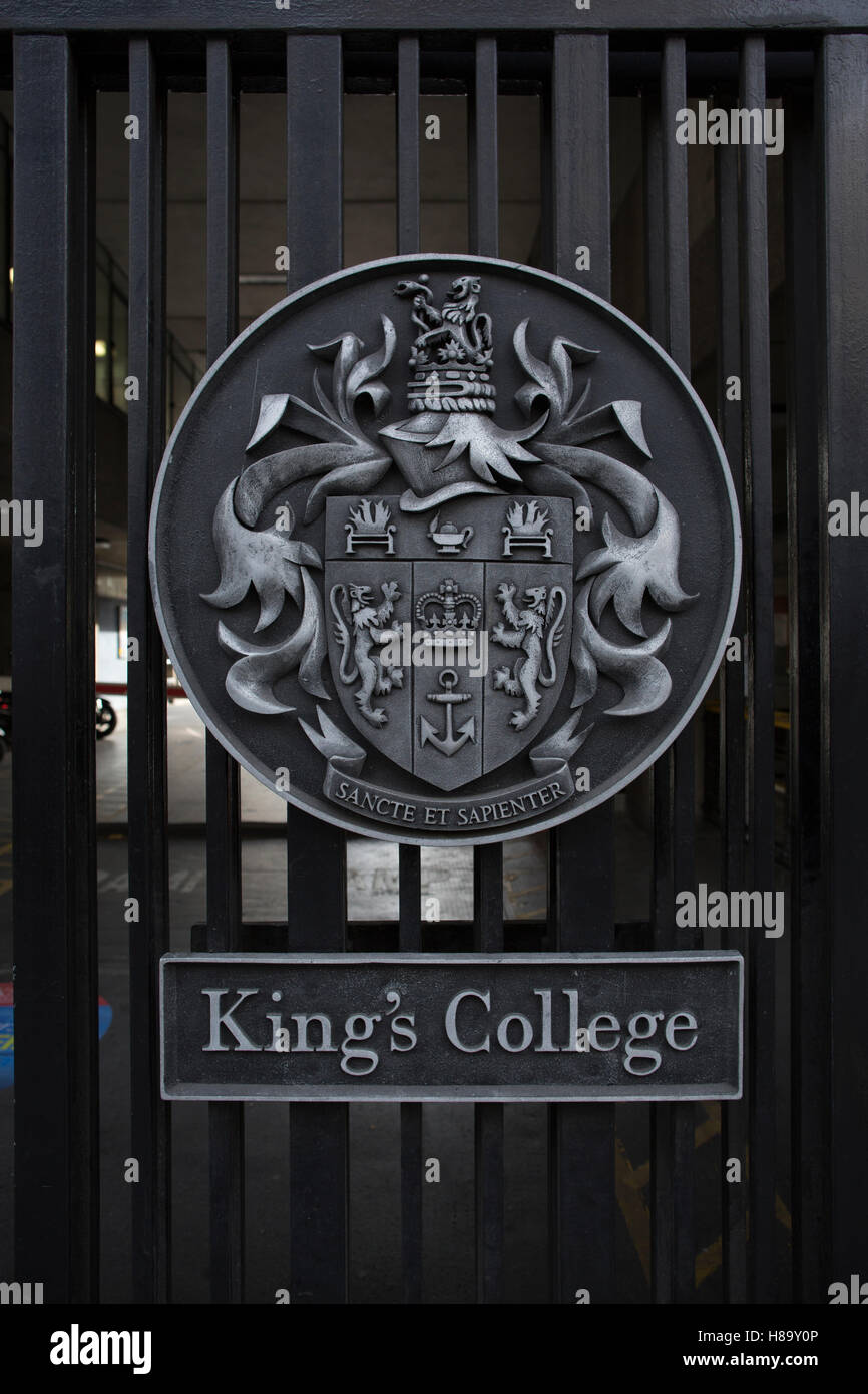 KIng's College London, the seal of King's College on the entrance gates facing the Strand in central London, England, UK Stock Photo