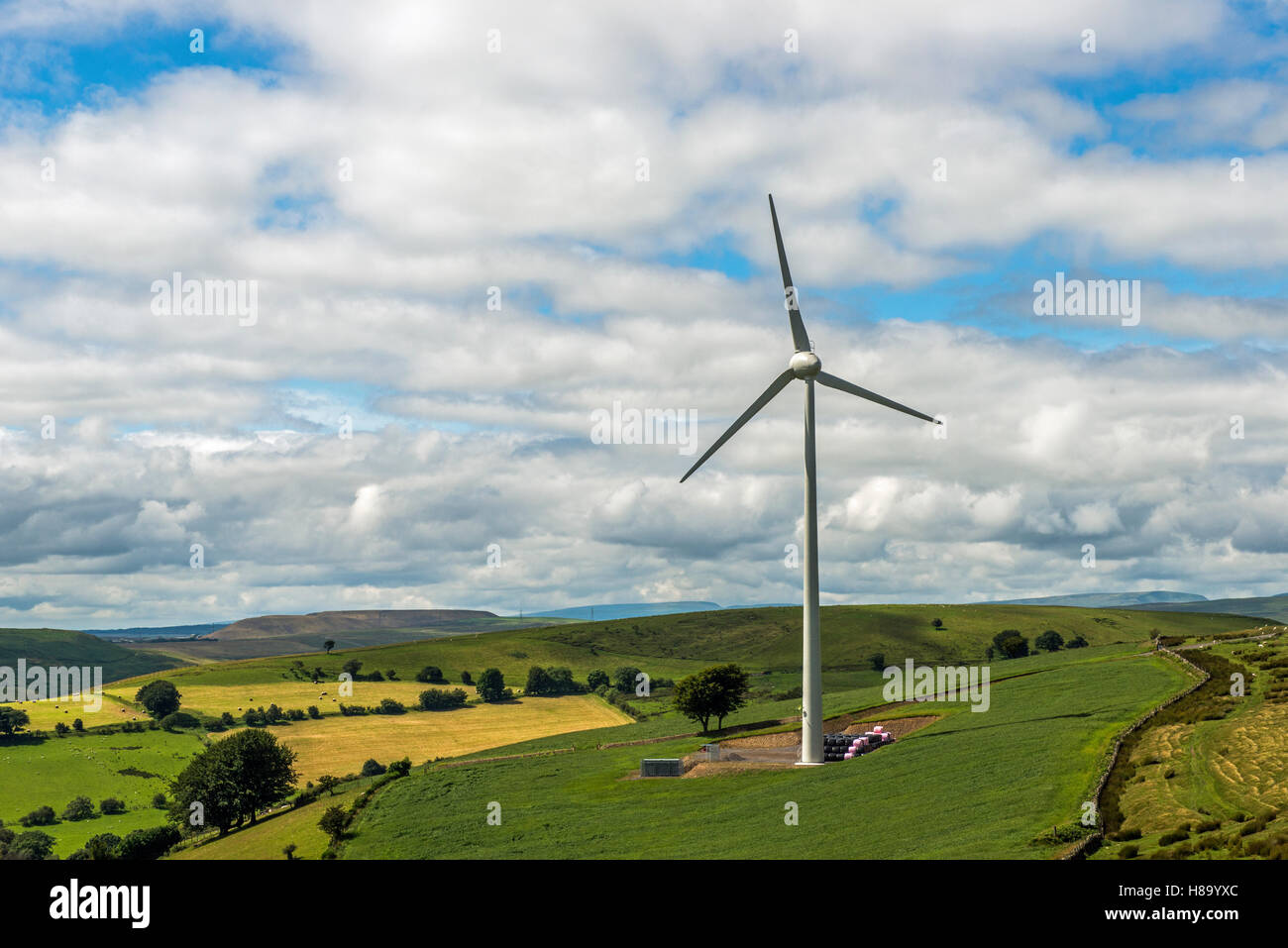 Single wind turbine in the hills between the south Wales valleys Stock Photo