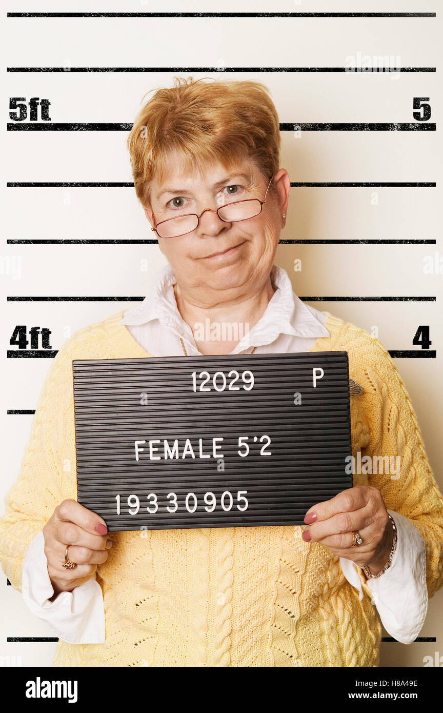 senior woman in police lineup Stock Photo