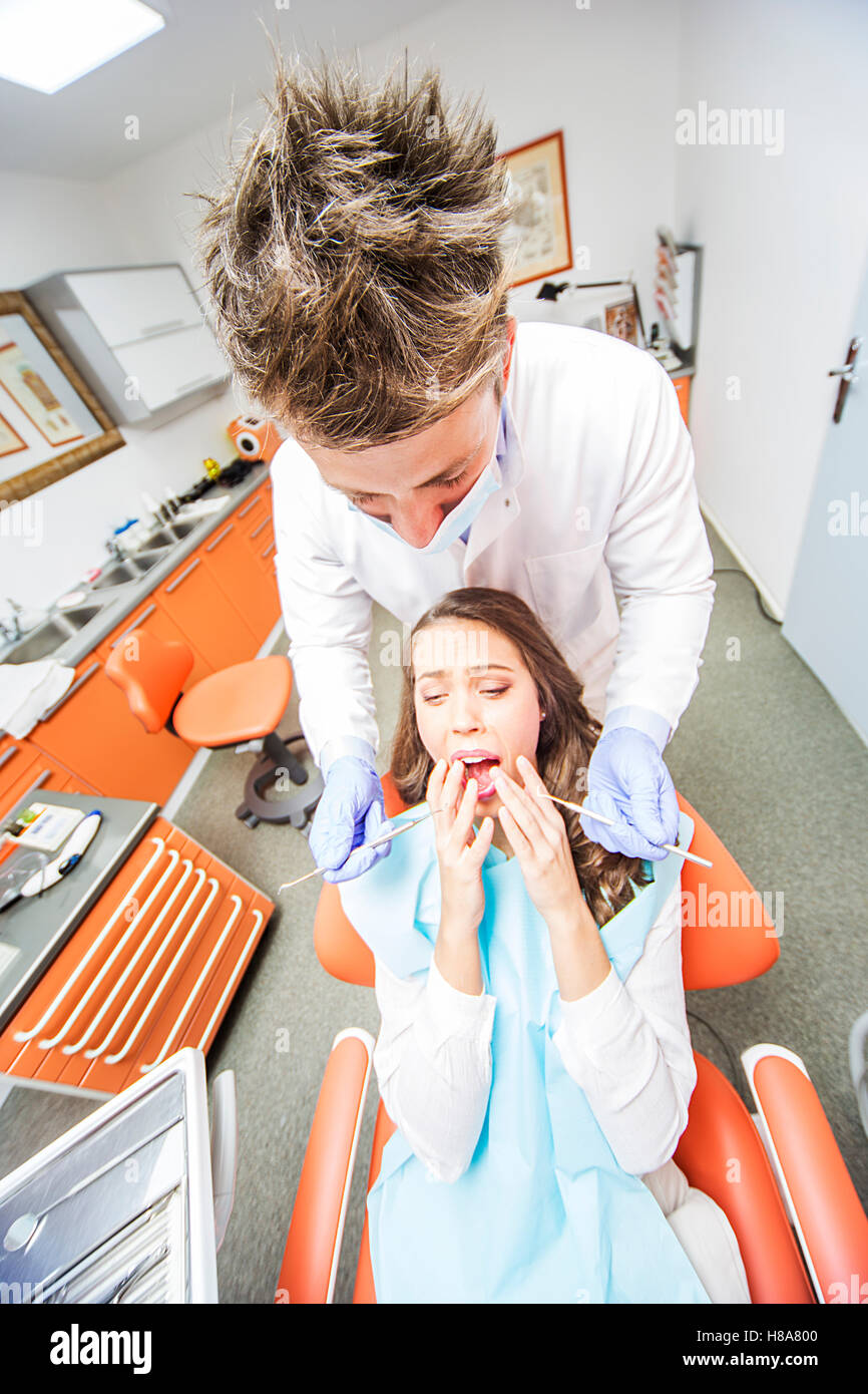 Young woman getting dental treatment in dentist office Stock Photo Alamy