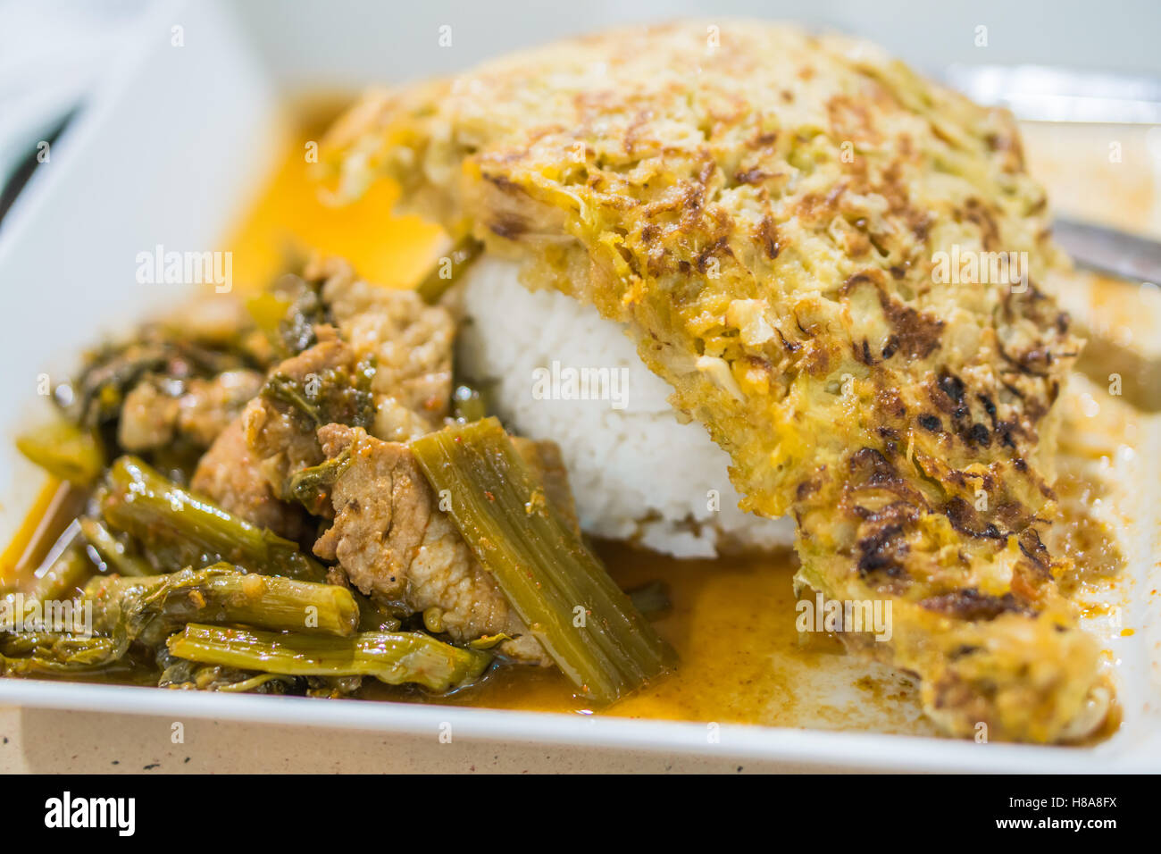 Fried pork and Omelet on rice,Thai menu Stock Photo