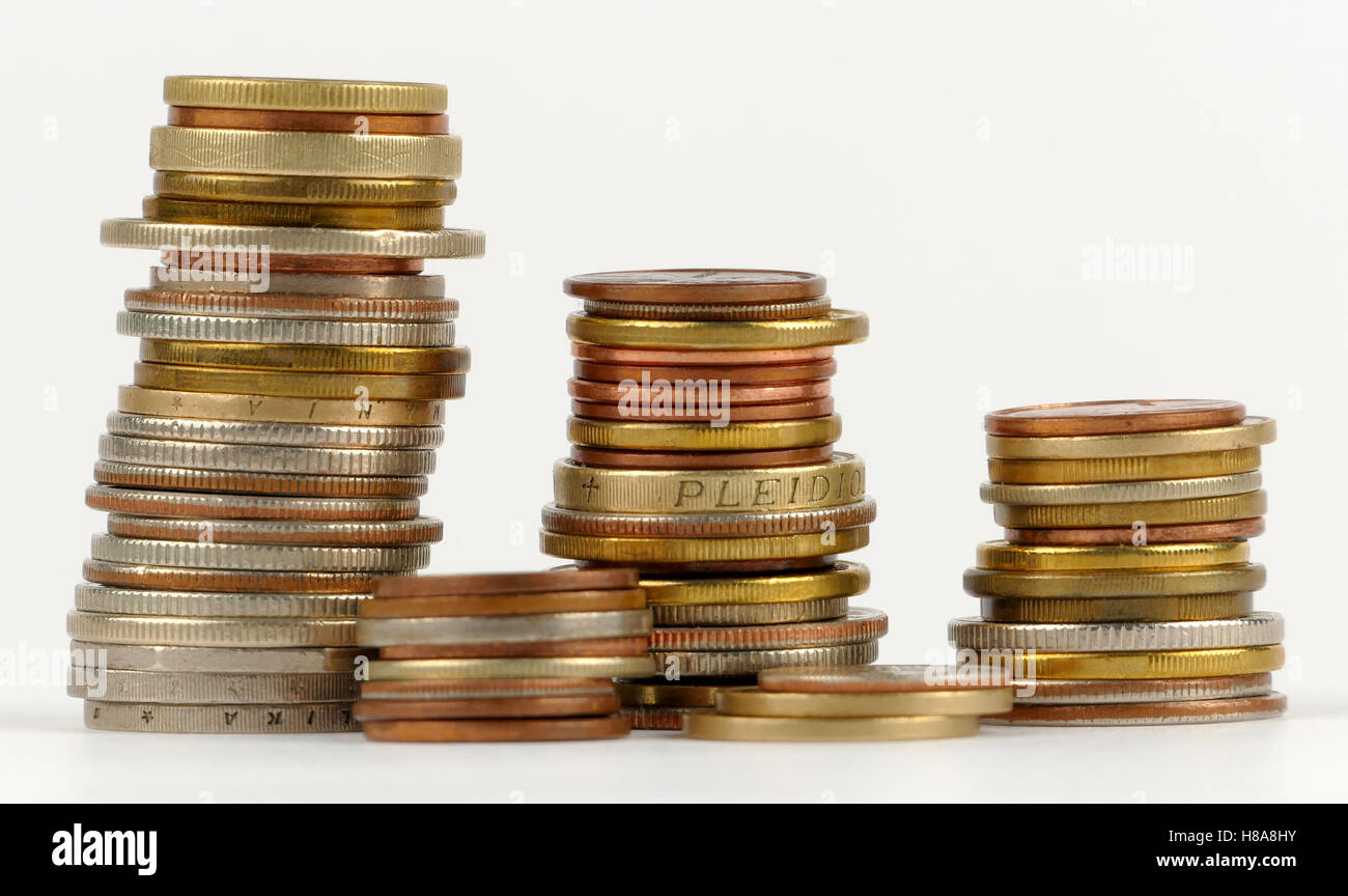 Pile of coins isolated on white background Stock Photo - Alamy