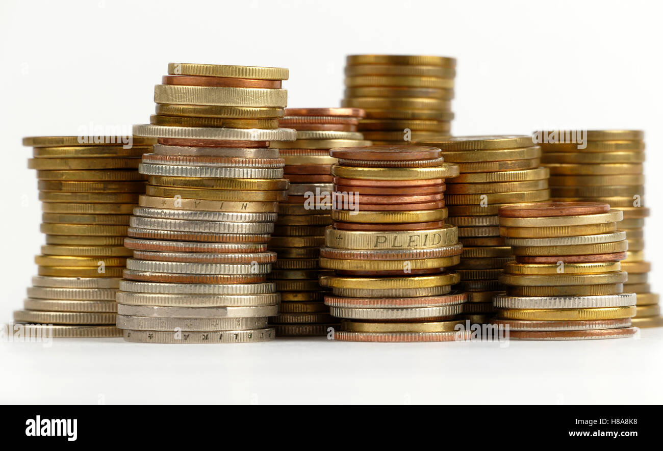 Pile of coins isolated on white background Stock Photo - Alamy