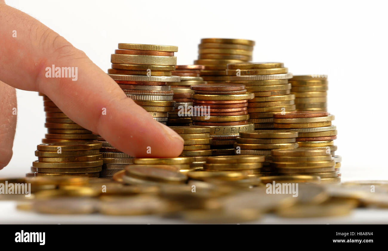 Pile of coins isolated on white background Stock Photo - Alamy