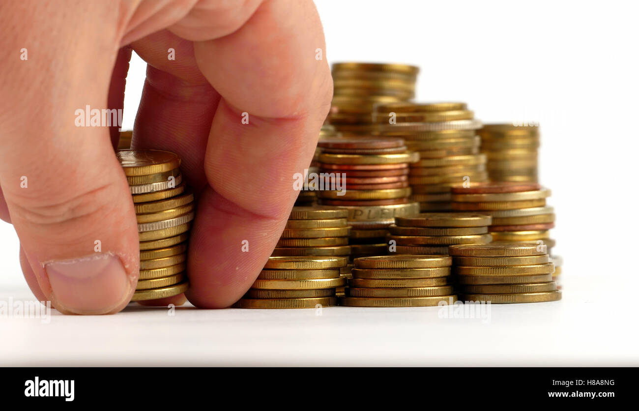 Pile of coins isolated on white background Stock Photo - Alamy
