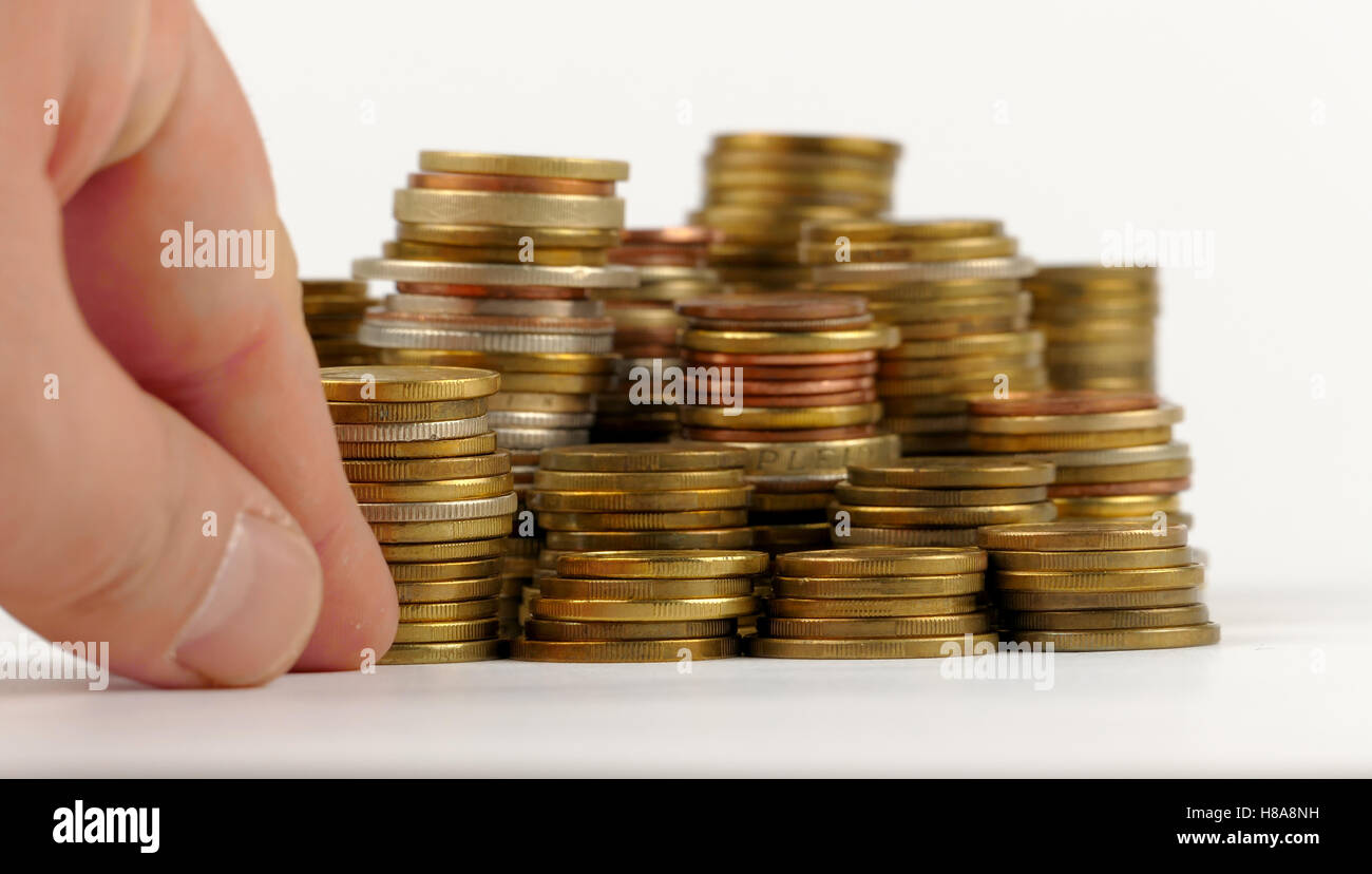 Pile of coins isolated on white background Stock Photo - Alamy