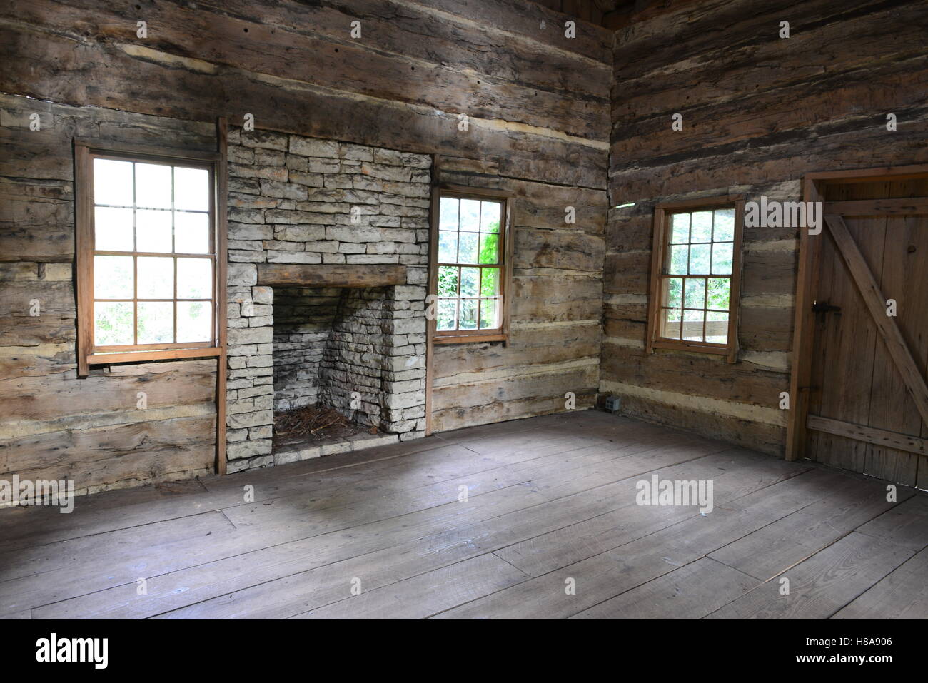 A fireplace in a log wood cabin in Texas Stock Photo Alamy