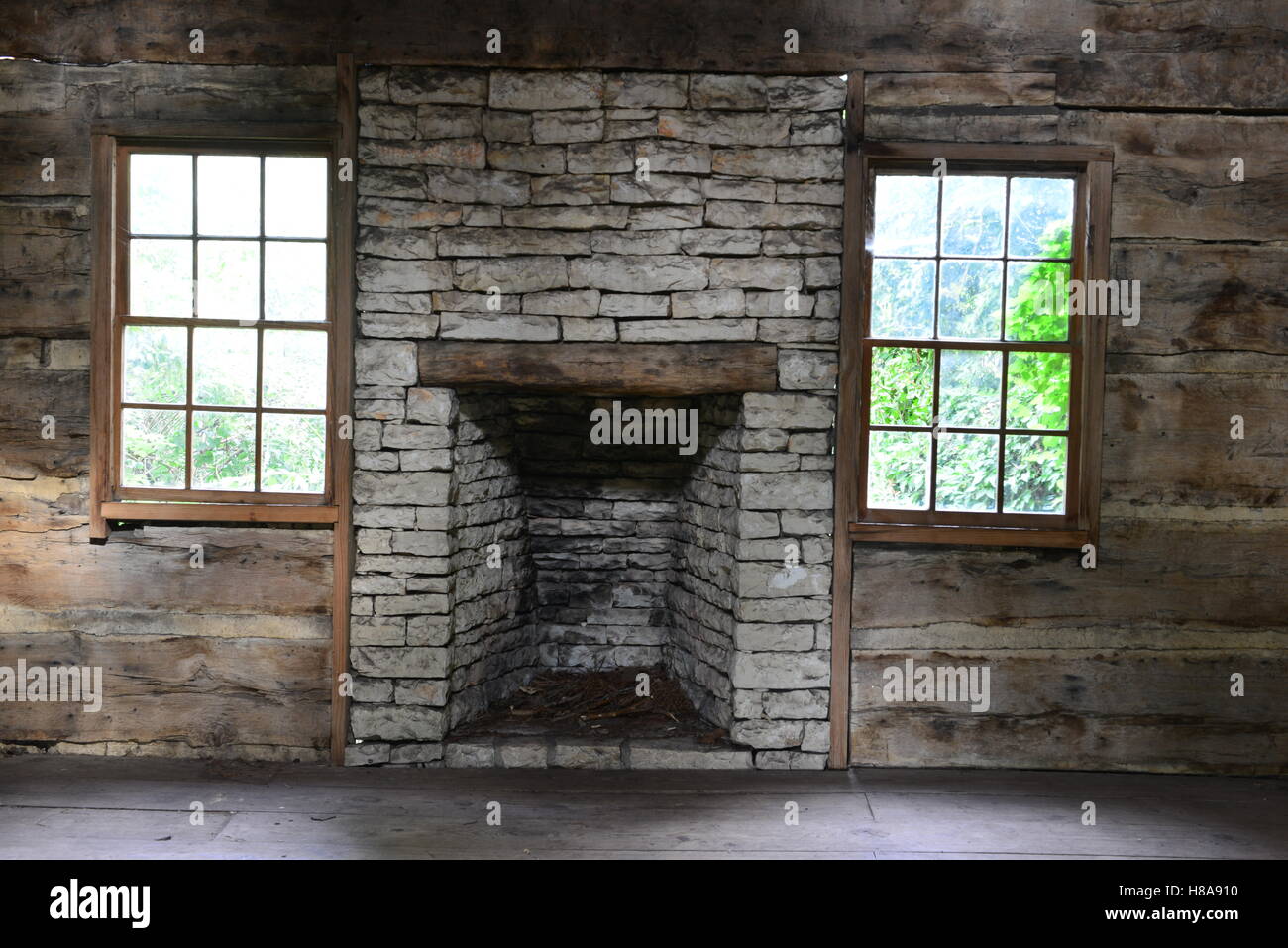 A fireplace in a log wood cabin in Texas Stock Photo Alamy