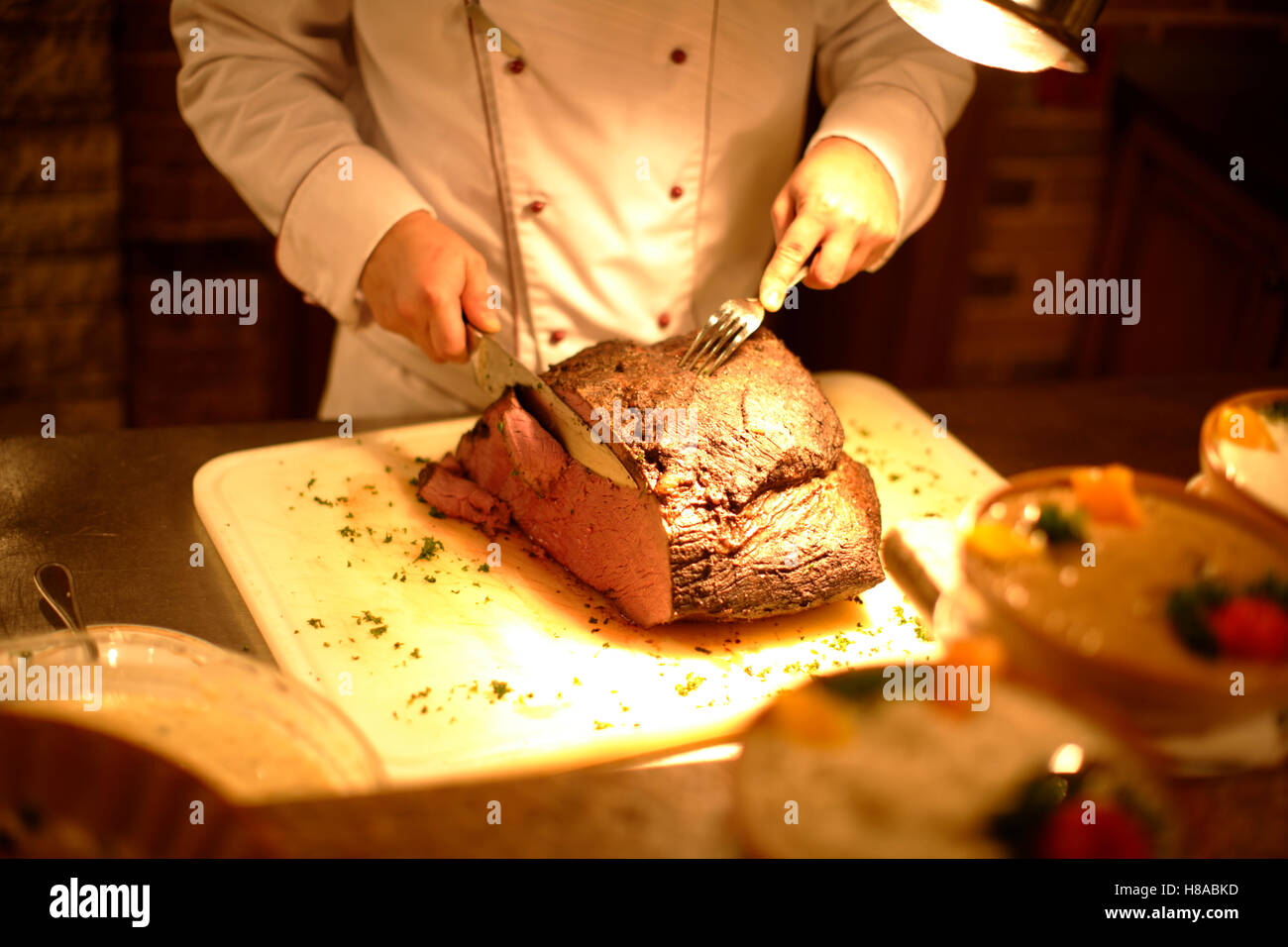 Chef carving roast beef Stock Photo Alamy