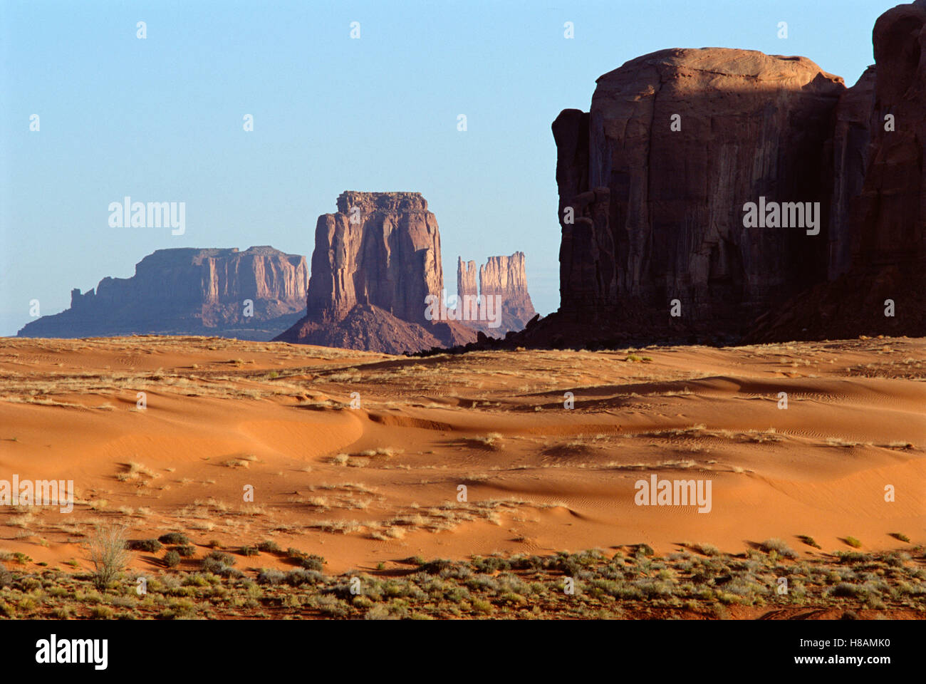 Butte Sand Eroded buttes and sand dunes in Monument Valley Navajo Tribal Park ...
