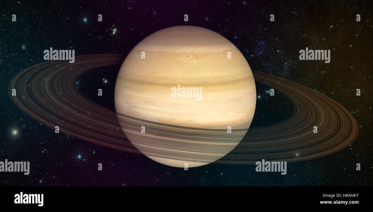 planet saturn with rings on the space background Stock Photo