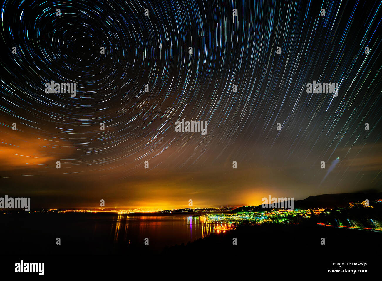 beautiful sky at night over izola with startrails Stock Photo