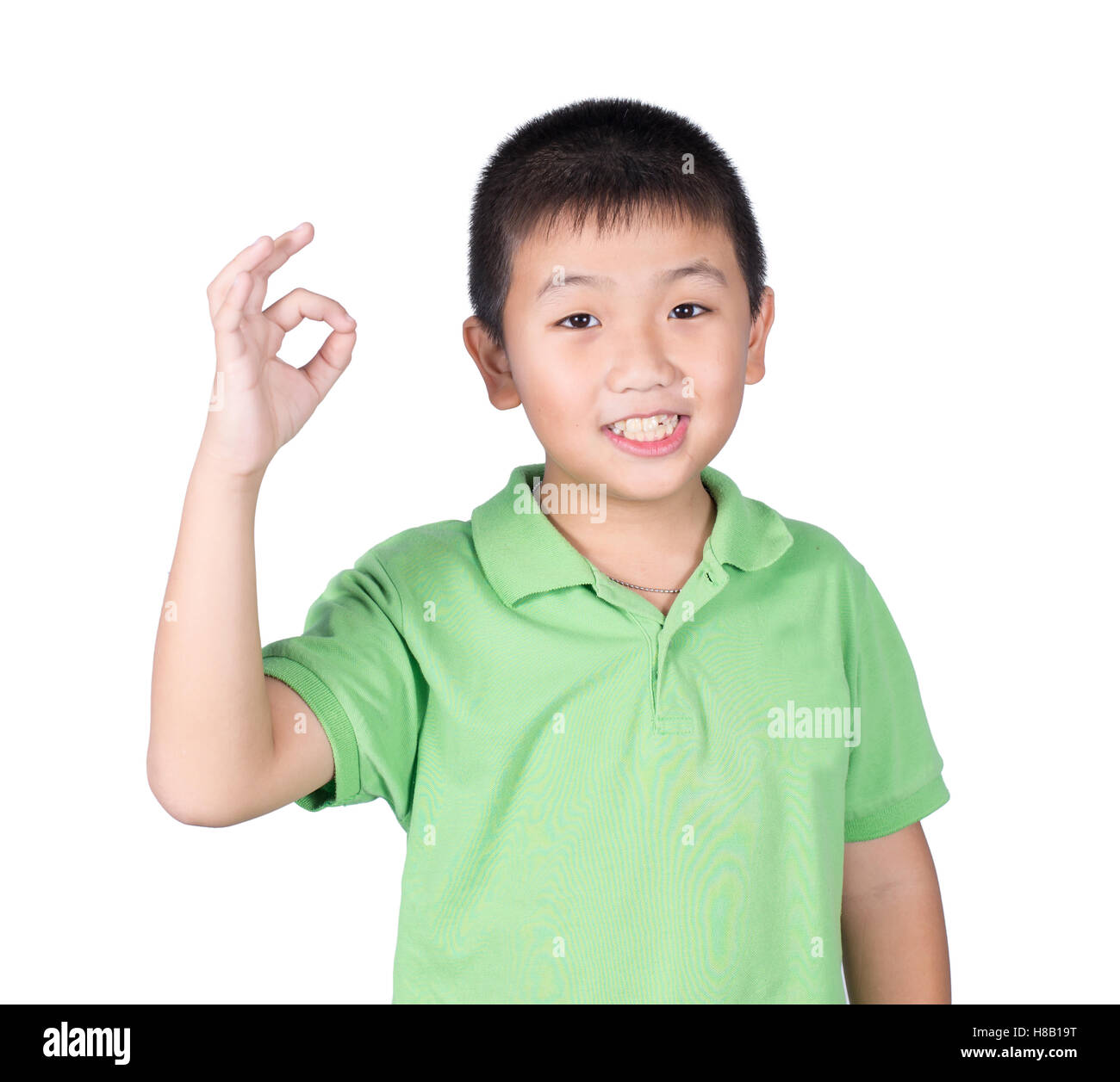 Cute boy making Ok sign isolated on white background Stock Photo