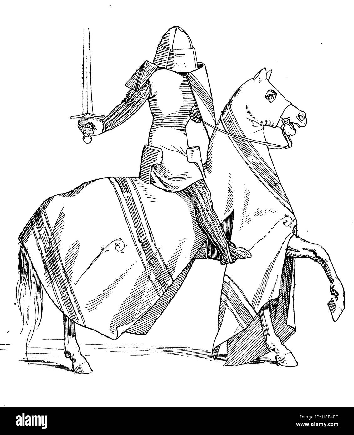 knight on horseback in full equipment, beginnung 14. century, History of fashion, costume story Stock Photo