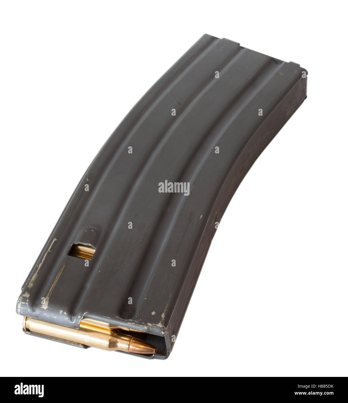 Magazine for an AR-15 that has brass cased ammo inside Stock Photo