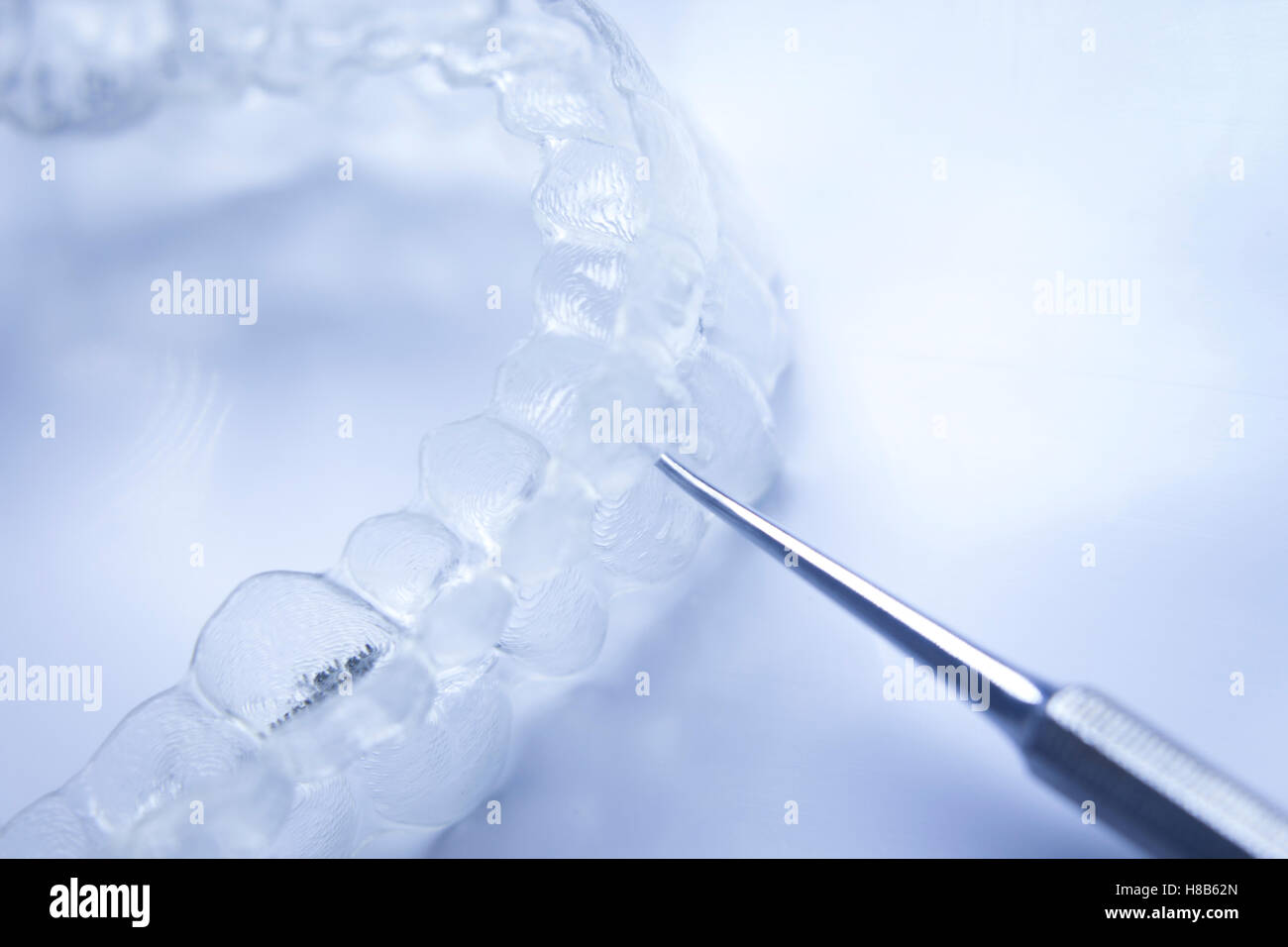 Invisible teeth aligner cosmetic orthodontic brackets used to