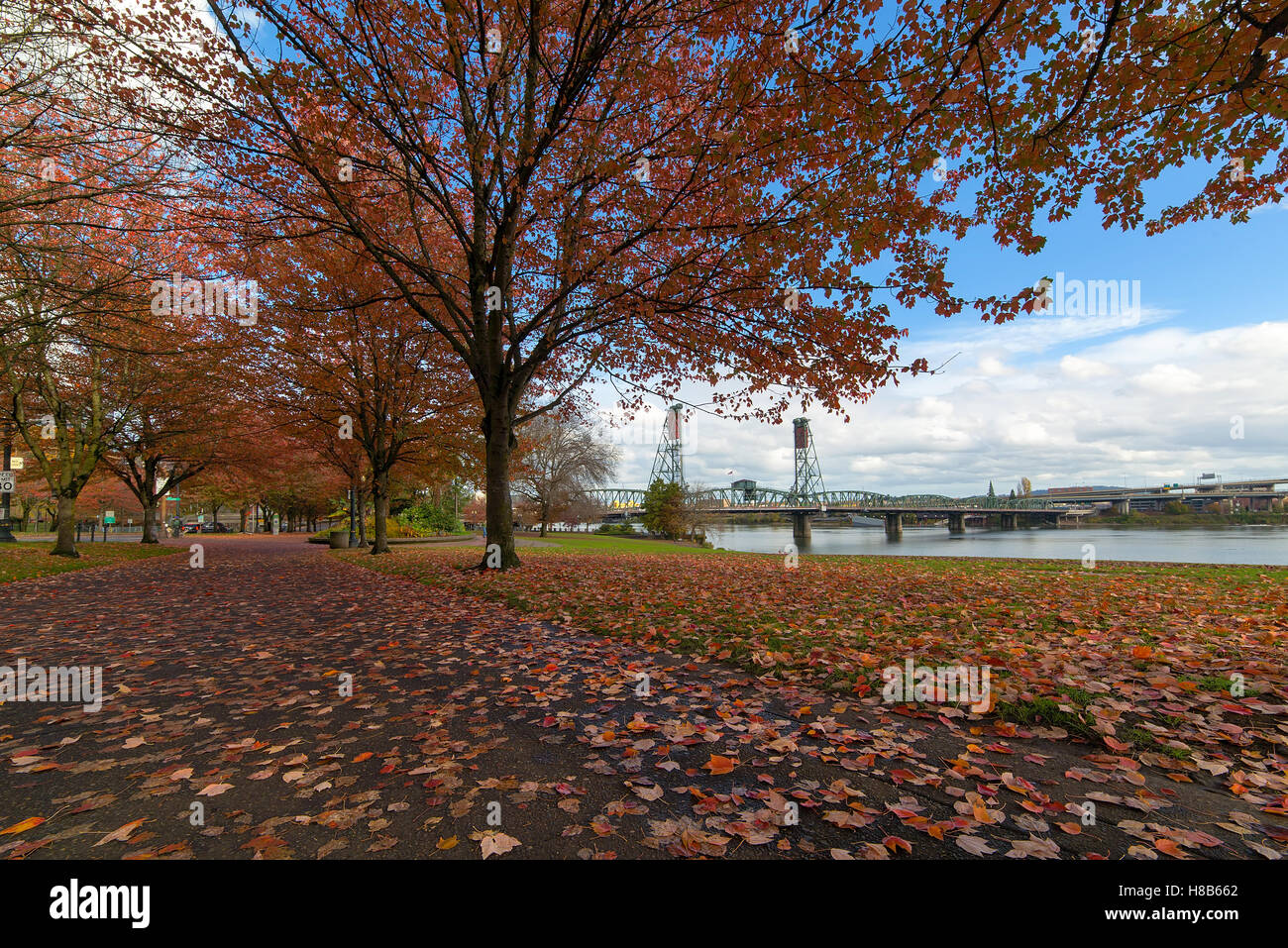 Portland Oregon city downtown waterfront park by Hawthorne Bridge in fall season Stock Photo