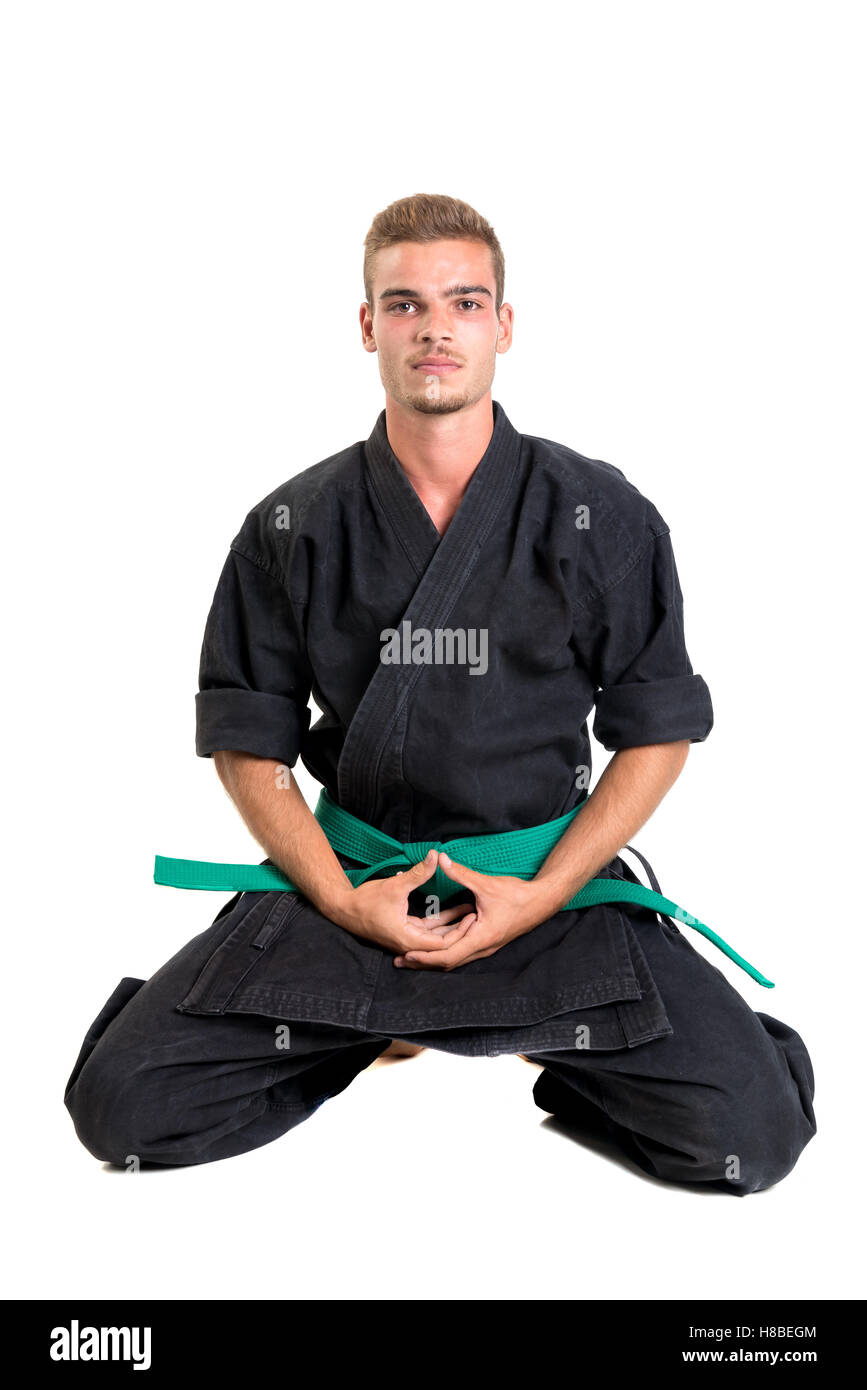 Martial arts student isolated in a white background Stock Photo Alamy