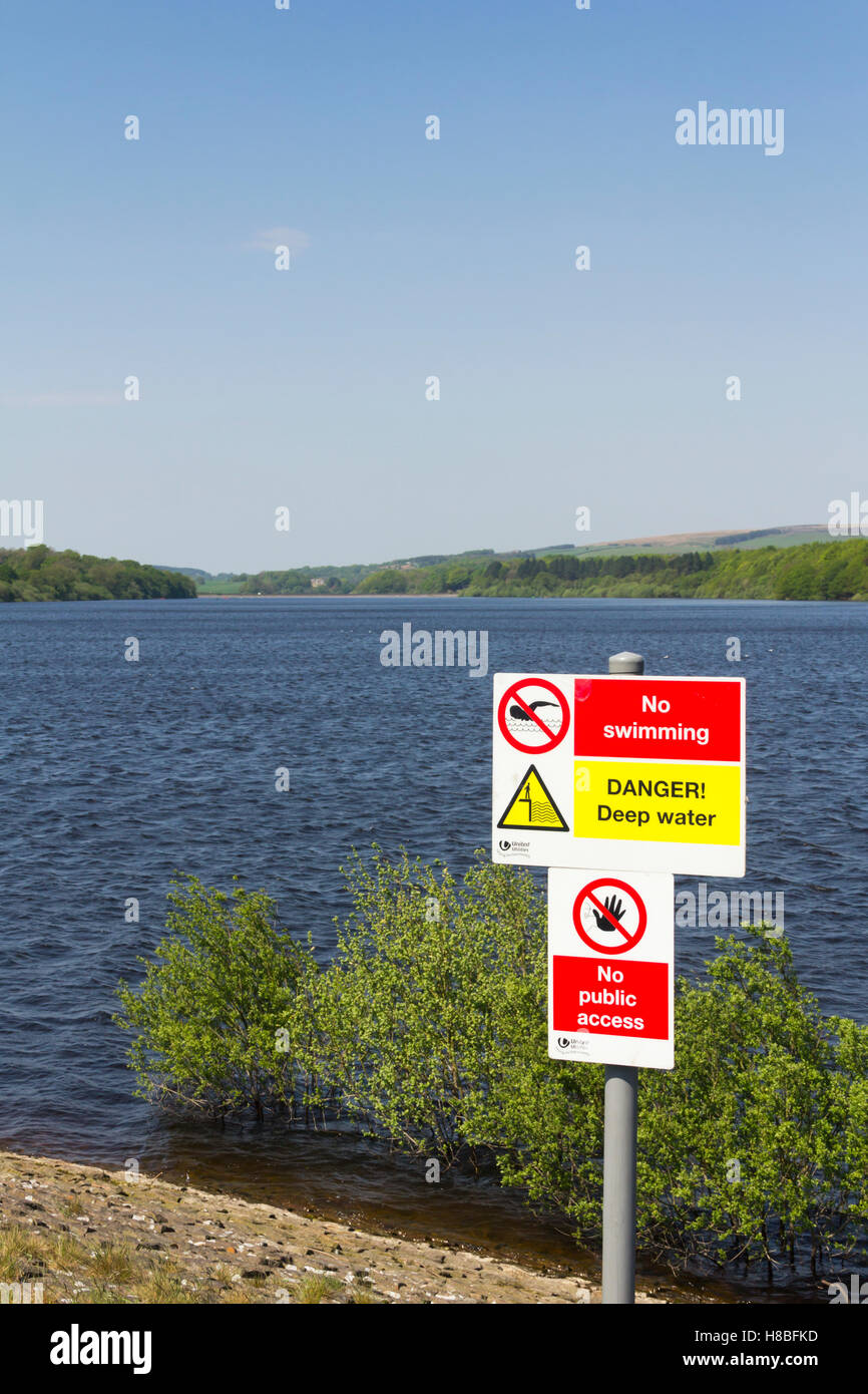 Danger deep water, no swimming sign at the south end of lower Rivington reservoir near Horwich, Lancashire. Stock Photo