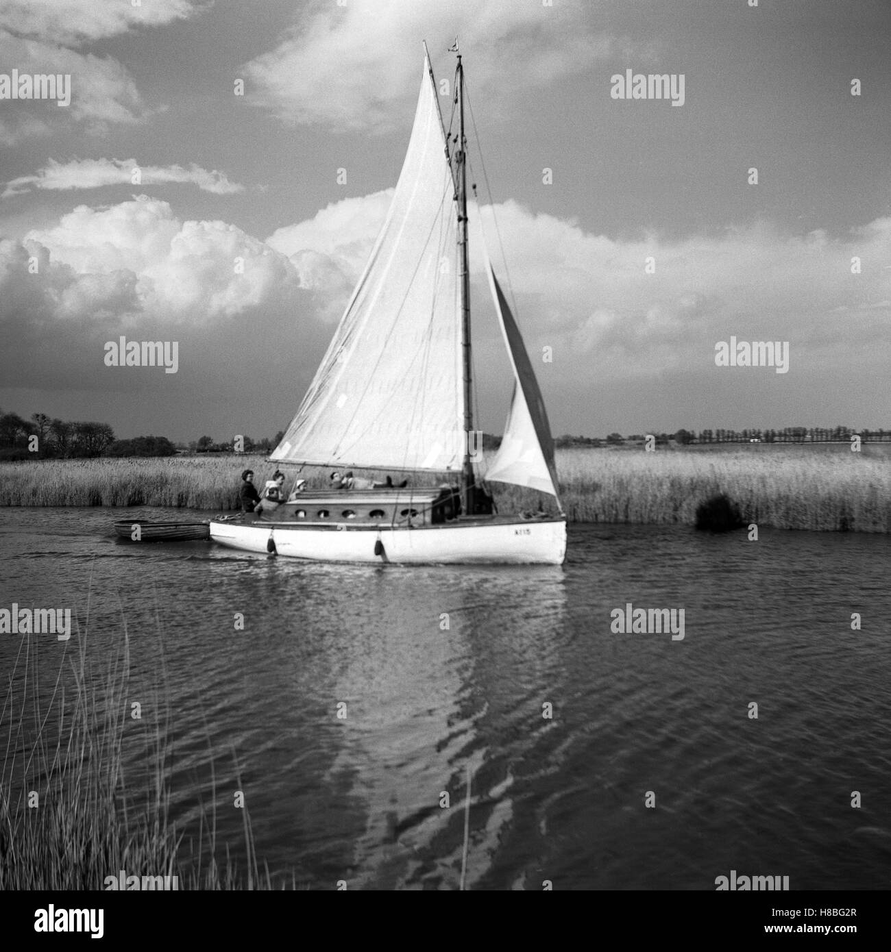 Sailing yacht on river Bure, Norfolk, England Stock Photo